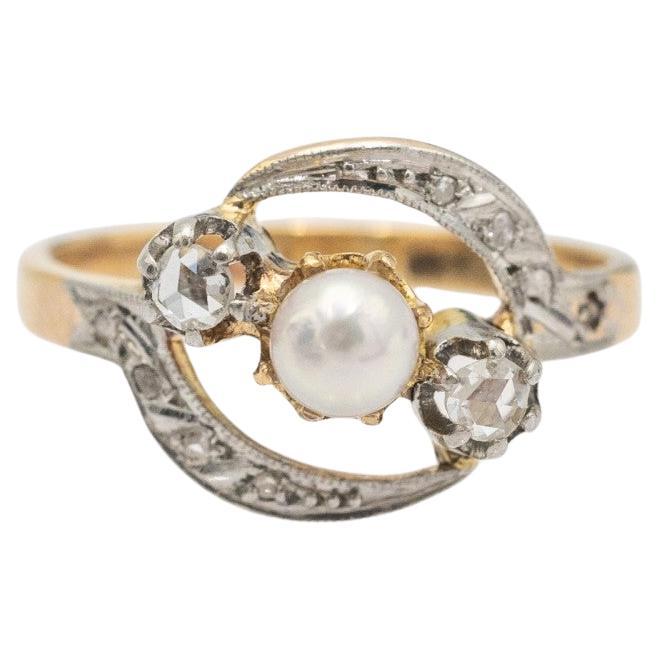 Anillo de oro Antique French con diamantes talla rosa y una perla