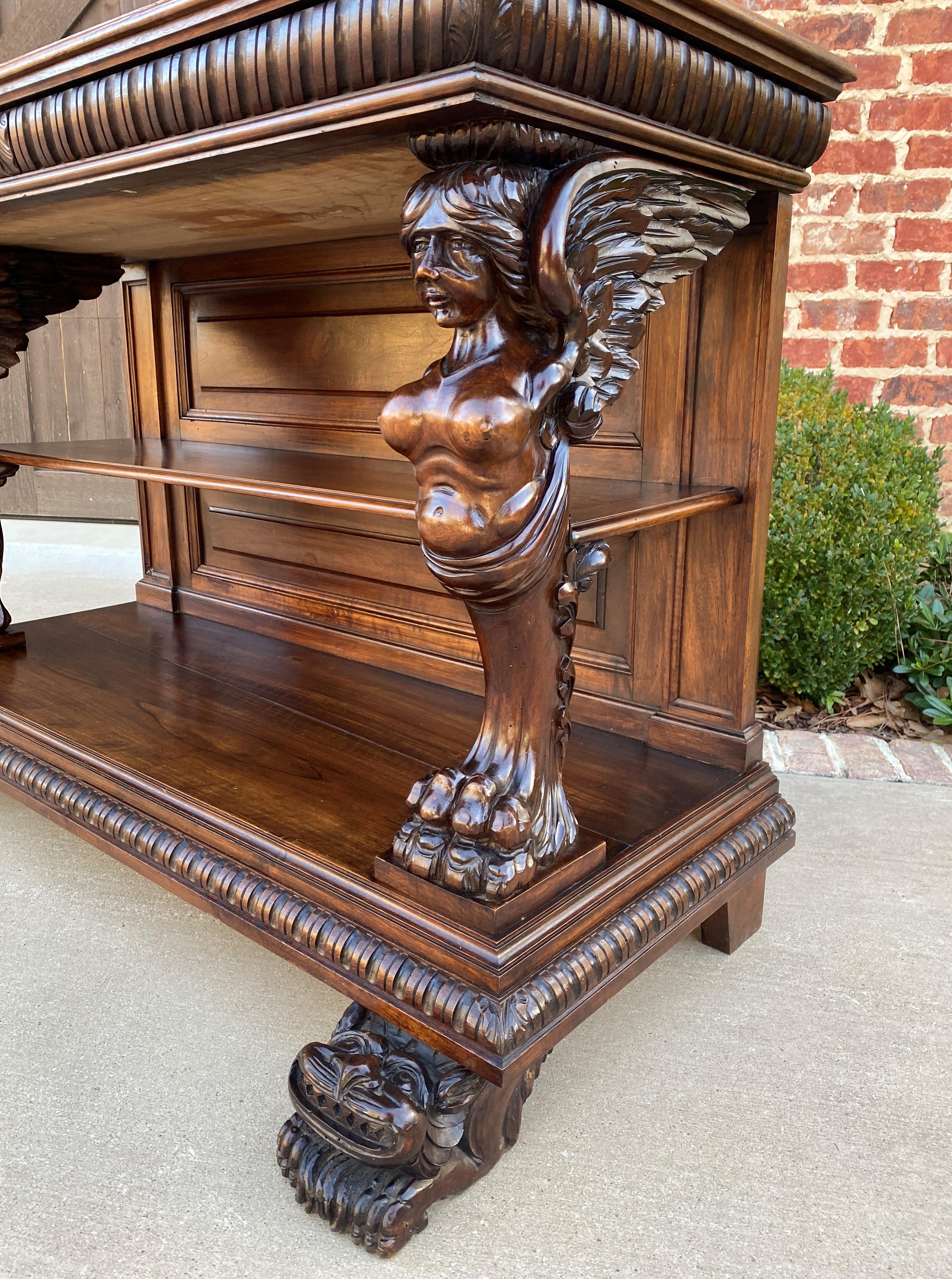 Carved Antique French Gothic Console Table Server Sideboard 2-Tier Walnut Winged Figure For Sale