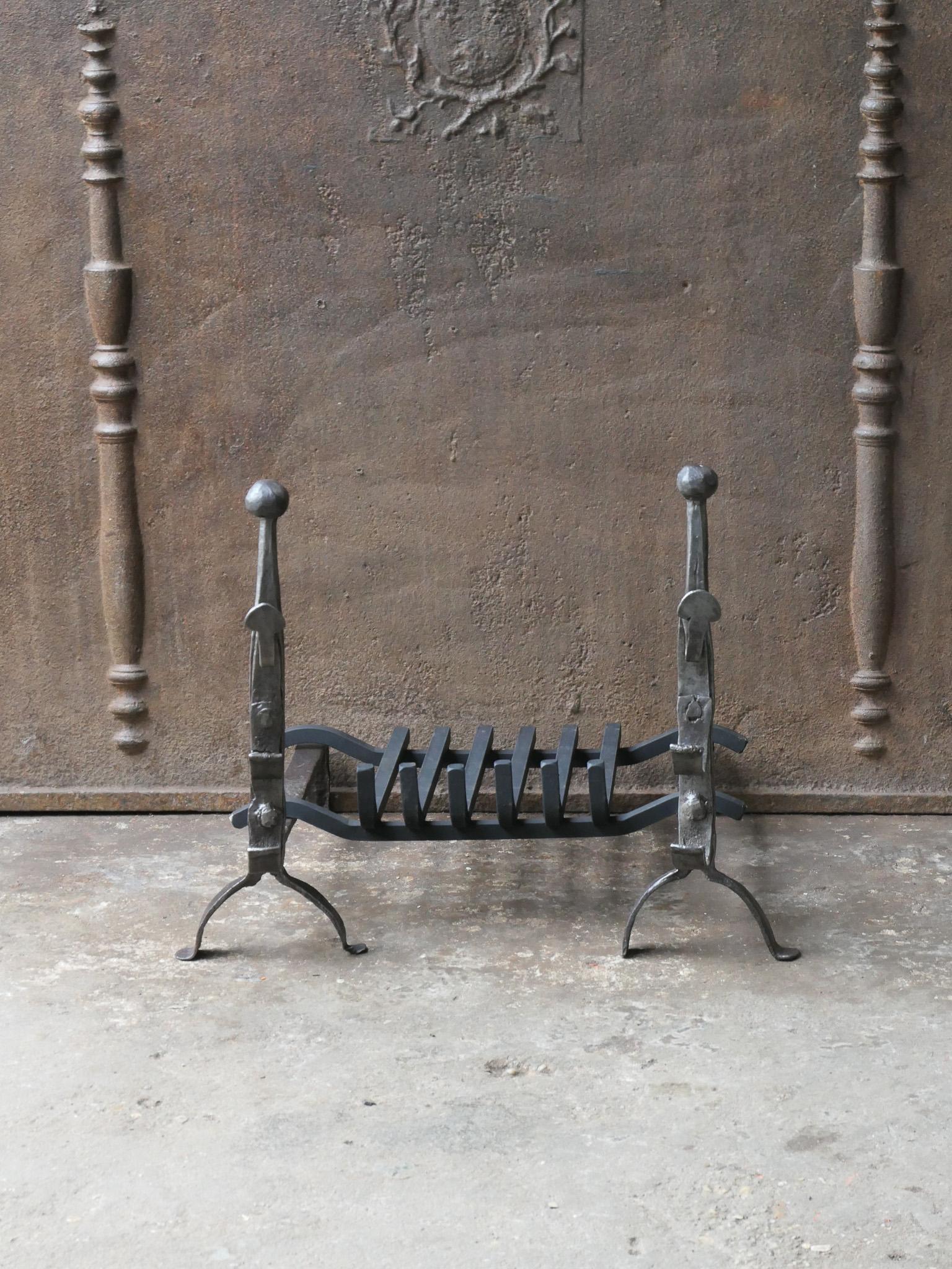 17th century French Gothic fire grate with period andirons and a newly forged grate. Made of wrought iron. The condition is good. 







