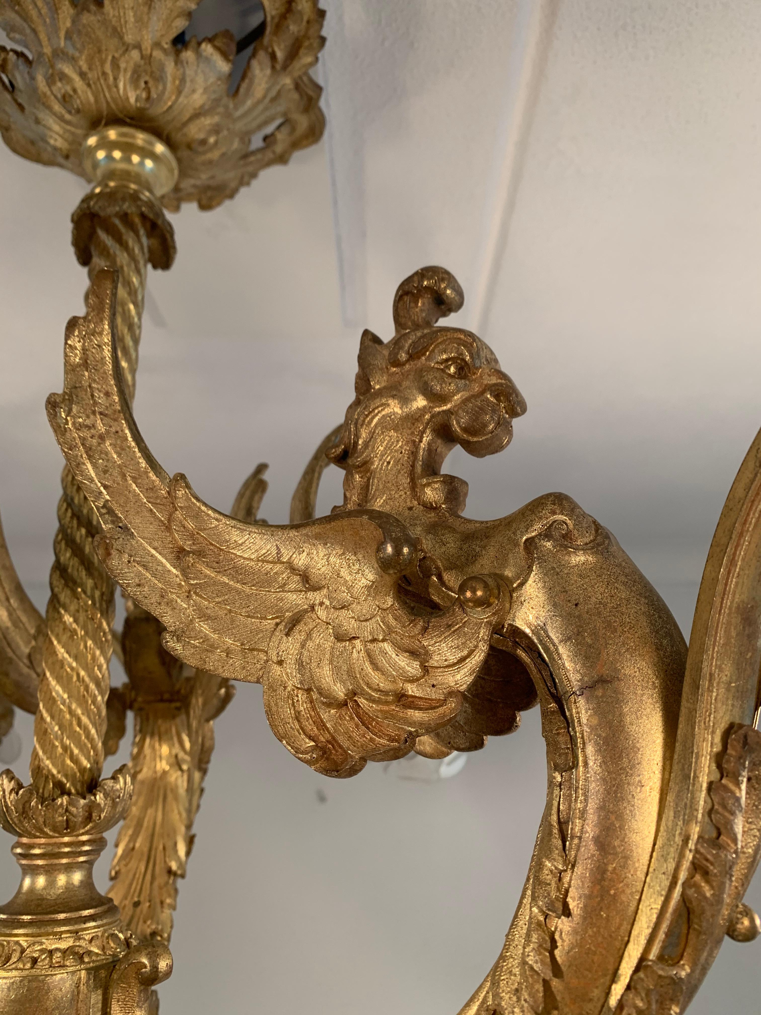 Majestic French Gothic Revival Gilt Bronze Chandelier, Winged Griffin Sculptures In Good Condition In Lisse, NL