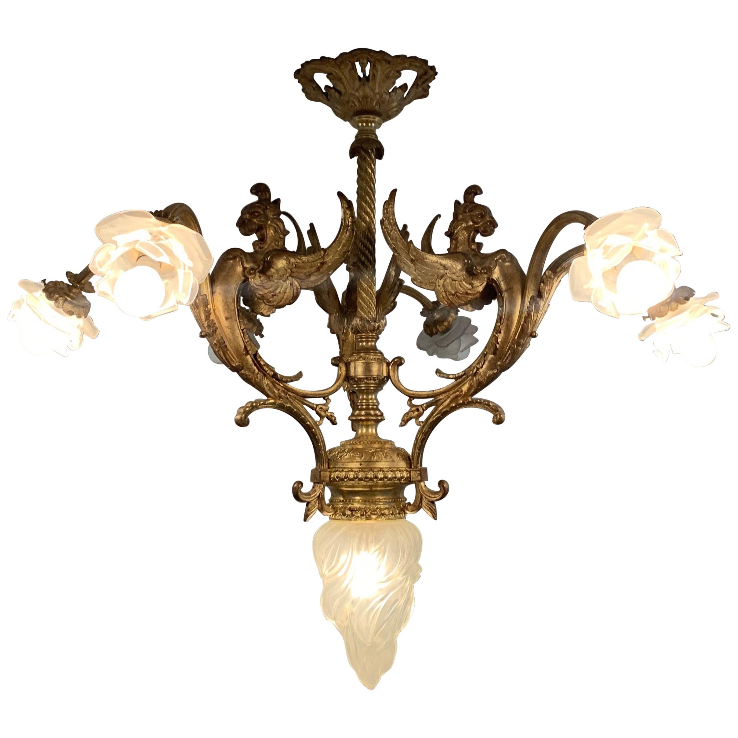 Majestic French Gothic Revival Gilt Bronze Chandelier, Winged Griffin Sculptures