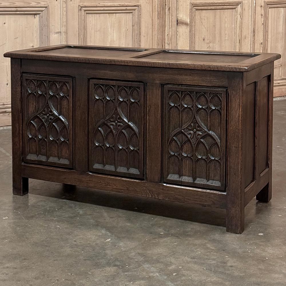 Antique French Gothic Trunk ~ Blanket Chest continues the legacy of the original form of cased furniture, creating a special piece that works behind the sofa, at the foot of the bed, along a cozy niche wall or even a stairwell landing.  Framed