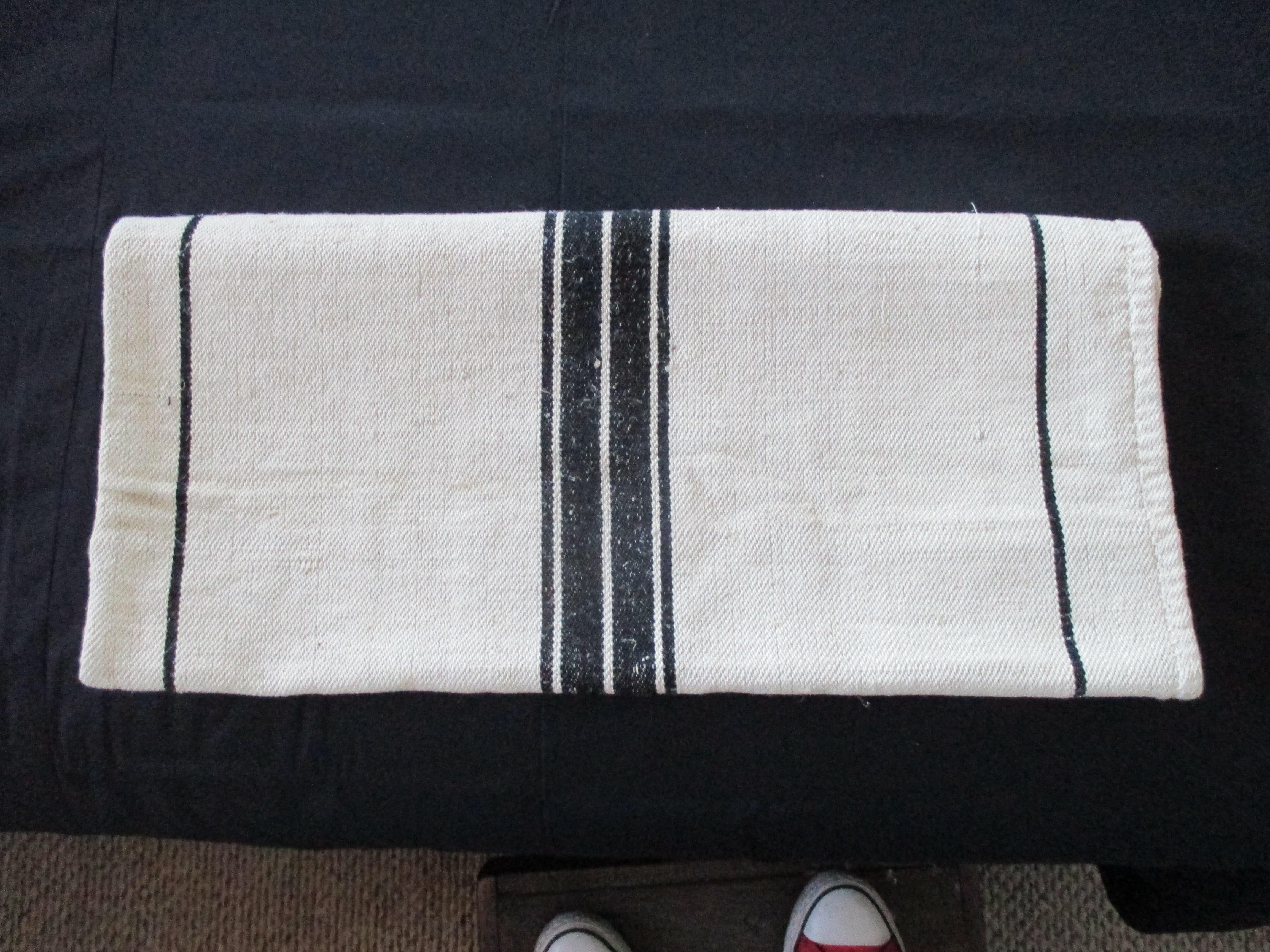 Antique French grain sack with black and natural stripes
Ideal for pillows and upholstery.
Size: 41