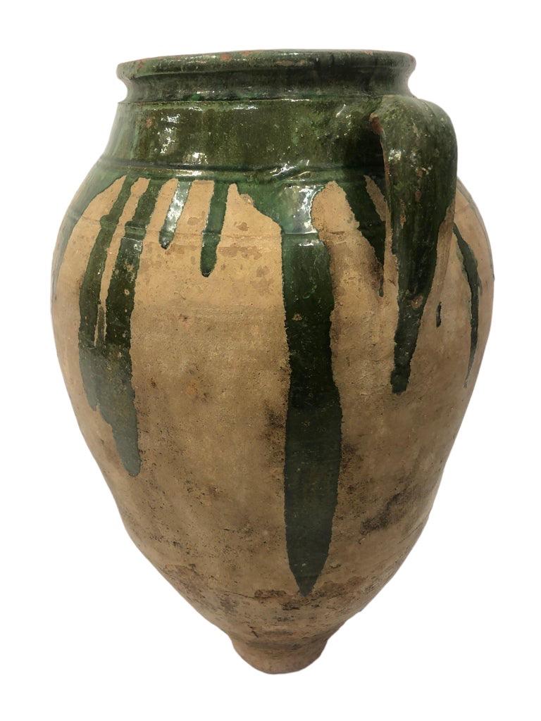 Antique French green jar

Property from esteemed interior designer Juan Montoya. Juan Montoya is one of the most acclaimed and prolific interior designers in the world today. Juan Montoya was born and spent his early years in Colombia. After