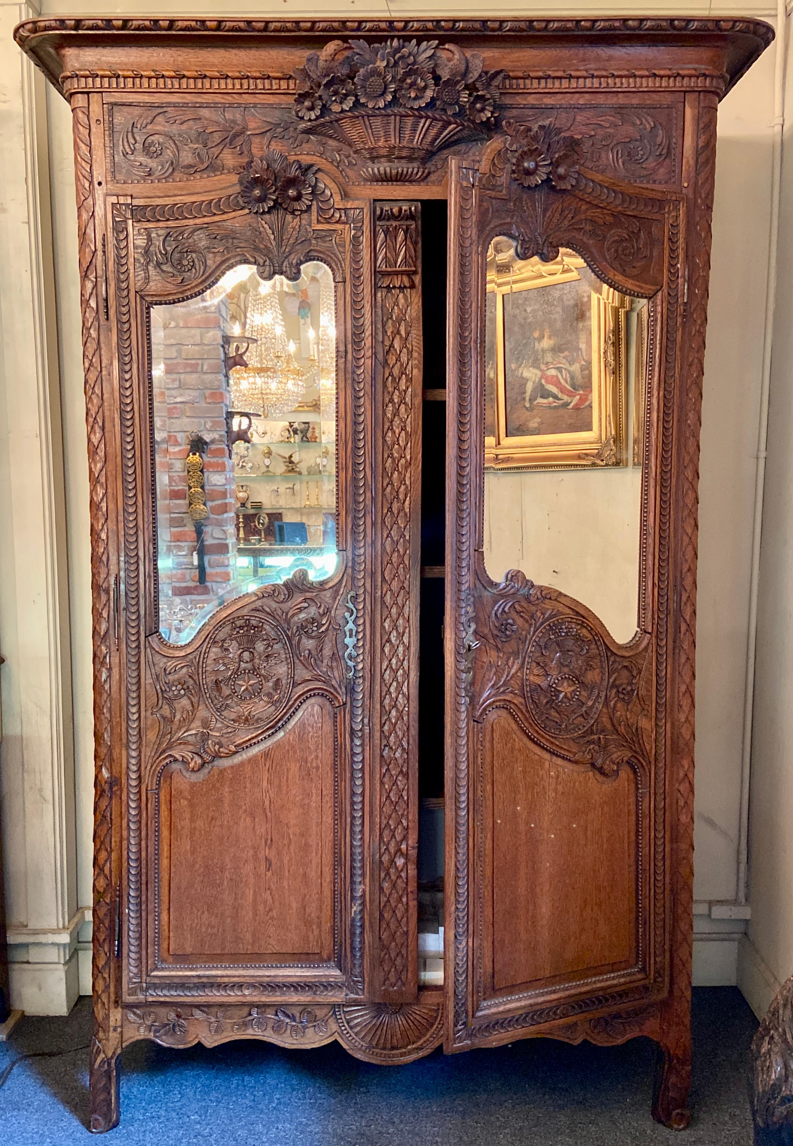 Antique French beautifully hand-carved elm & beveled mirror 