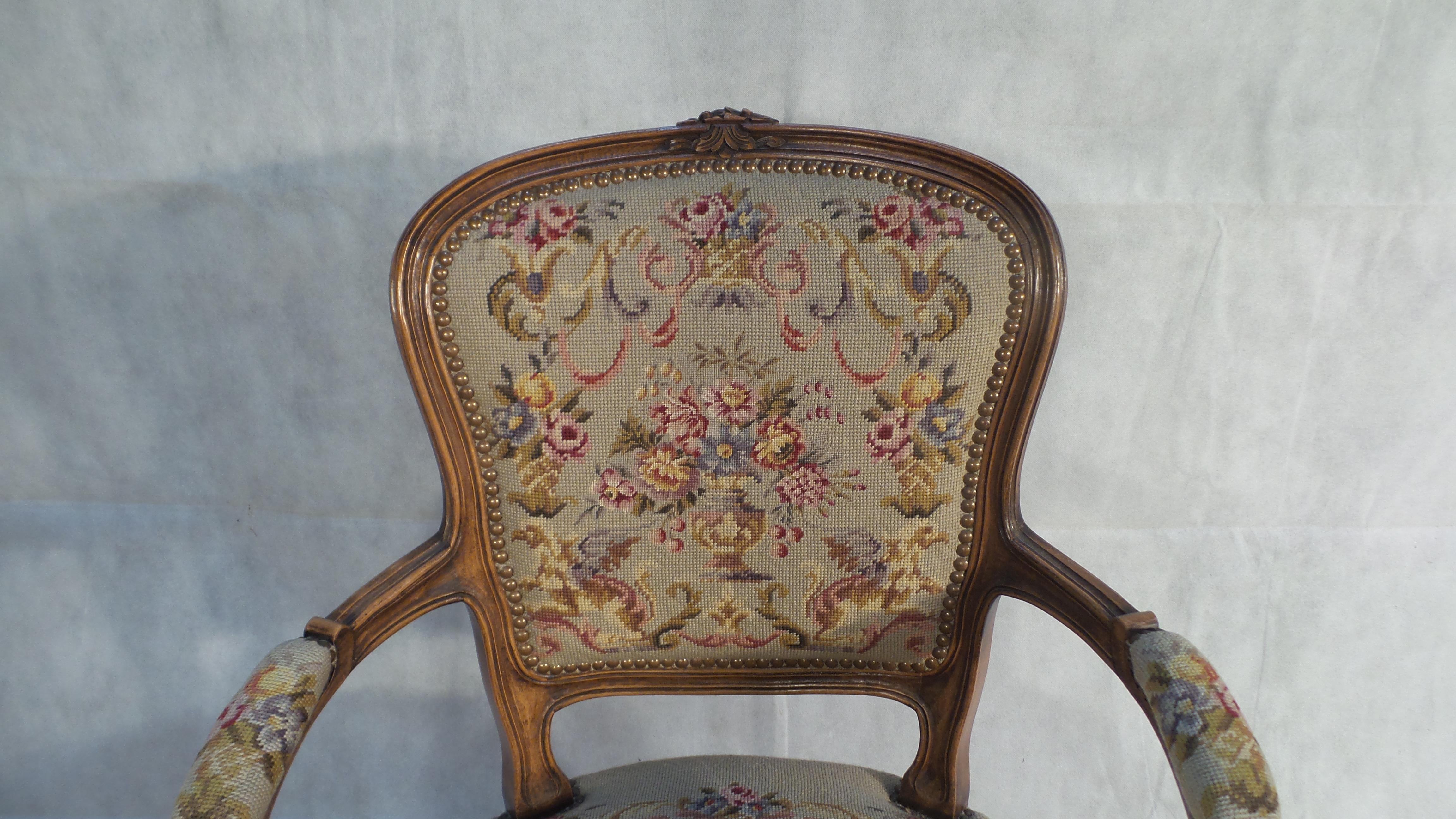 An outstanding example of this timeless example of French chic. This beautiful armchair has a tapestry seat and back with a delicate and elegant oak frame

The chairs background is in neutral colors whilst the detailed tapestry design is in