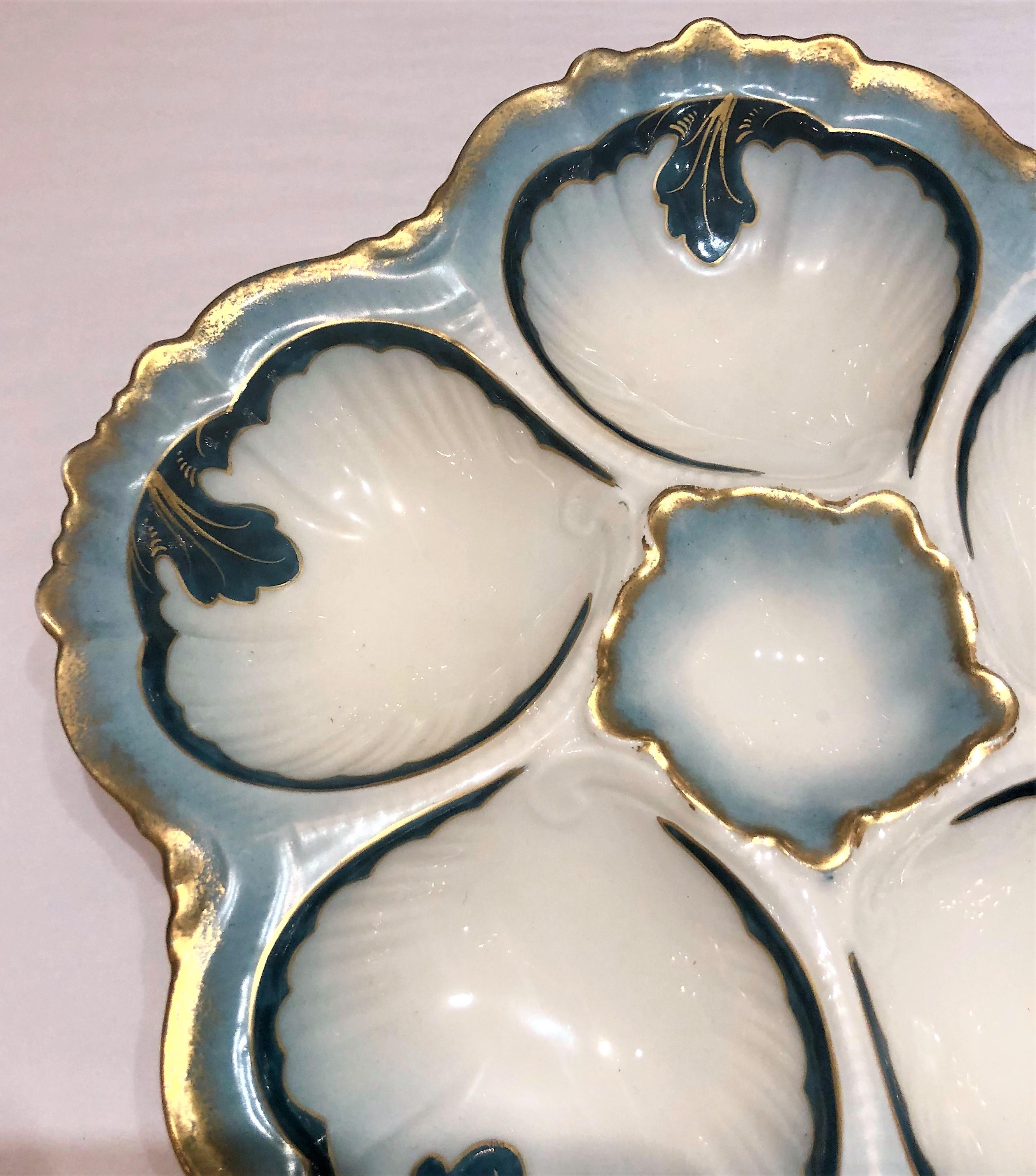 Antique French hand-painted oyster plate made for Tressemanes & Vogt, circa 1900.