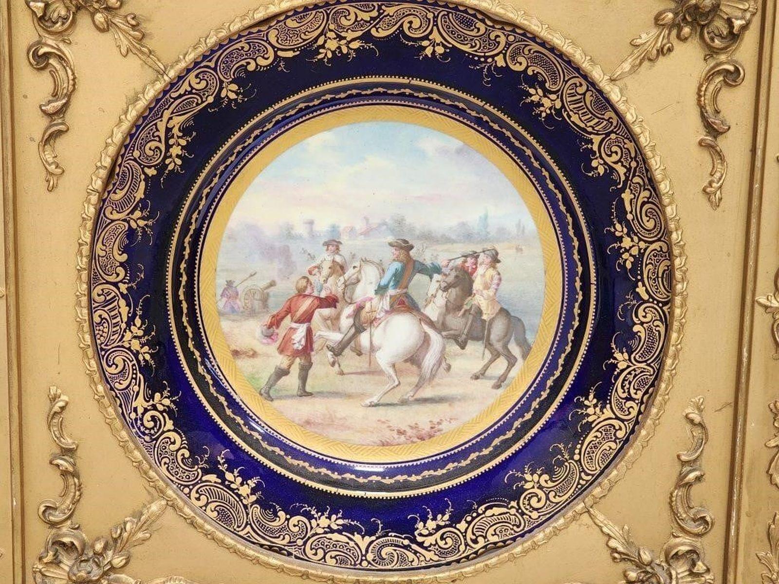 Antique French Hand Painted Sevres Plate in Frame. There is a connected chain for hanging. This is a a custom-made gilt wood frame with ornate design. measures approx - 15.5 x 15.5
