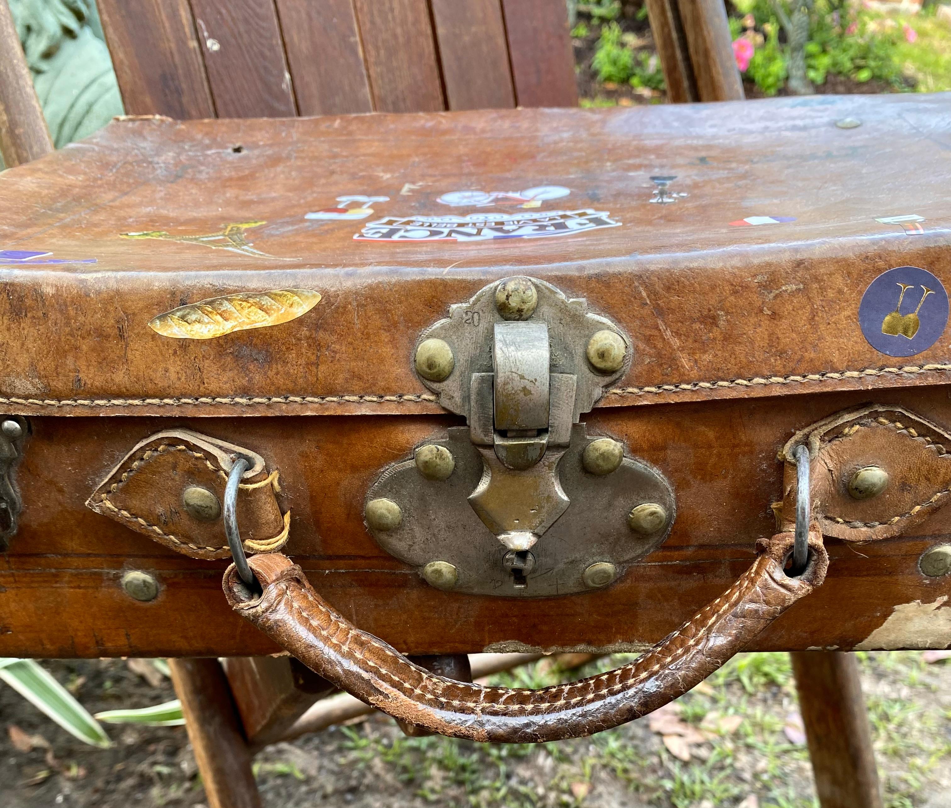 Antique French Hand Stitched Leather Suitcase In Fair Condition In New Orleans, LA
