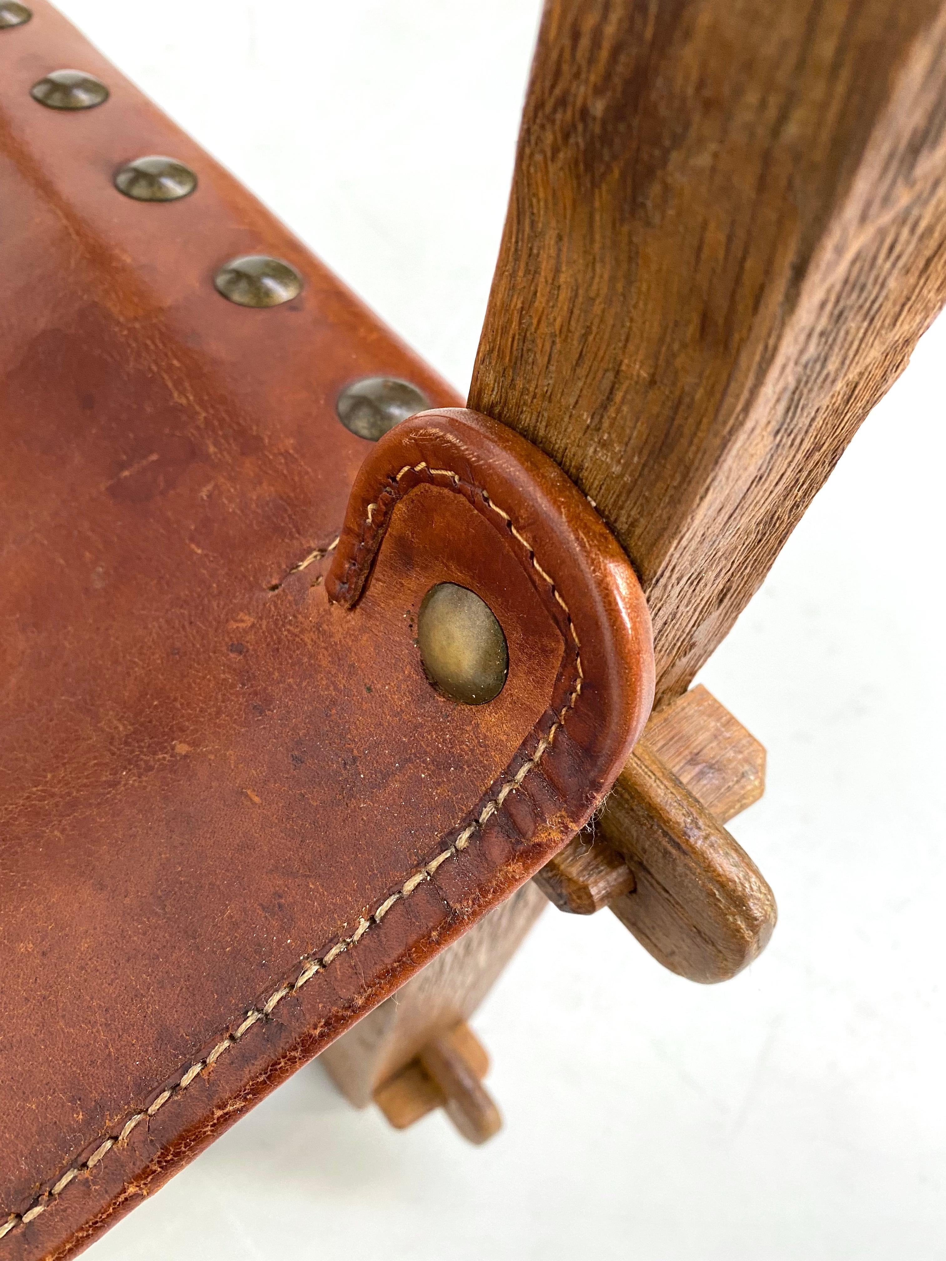 French Provincial Antique French Handmade Brutalist Oak & Cognac Leather Castle Armchair, 1920s For Sale