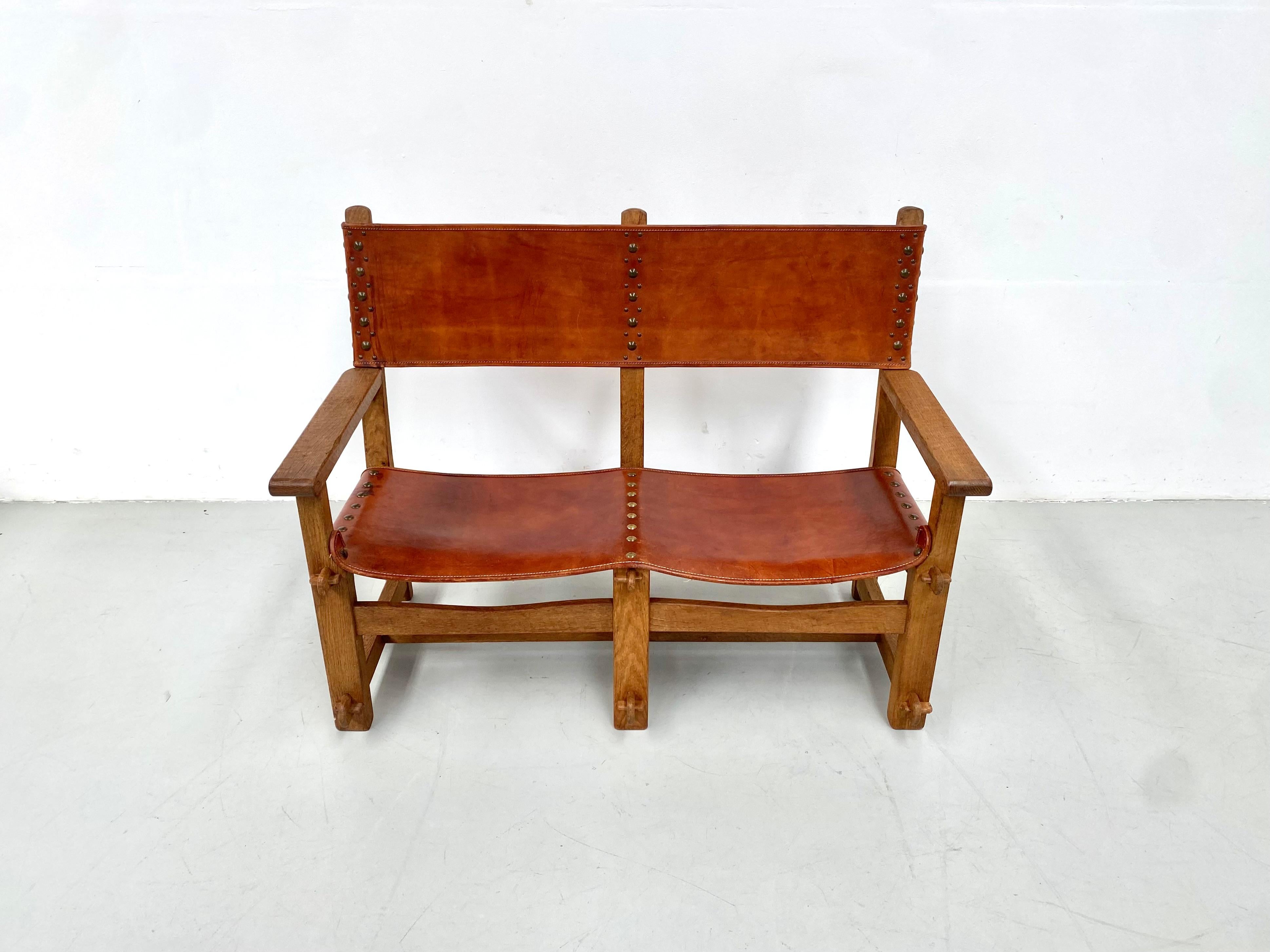 20th Century Antique French Handmade Brutalist Oak & Cognac Leather Castle Bench, 1920s For Sale