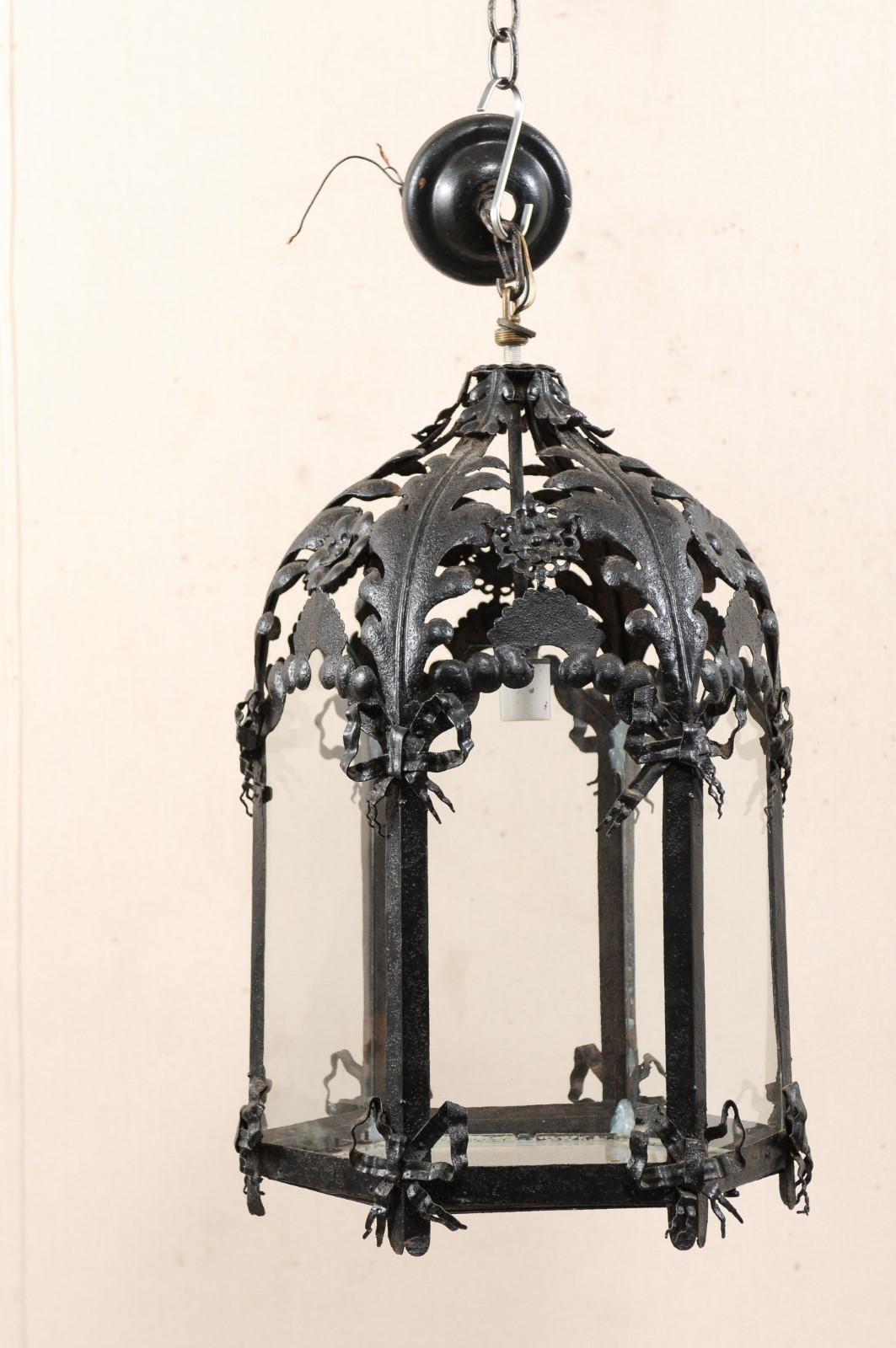 Antique French Hanging Black Iron Lantern with Ribbon and Floral Motif In Good Condition In Atlanta, GA