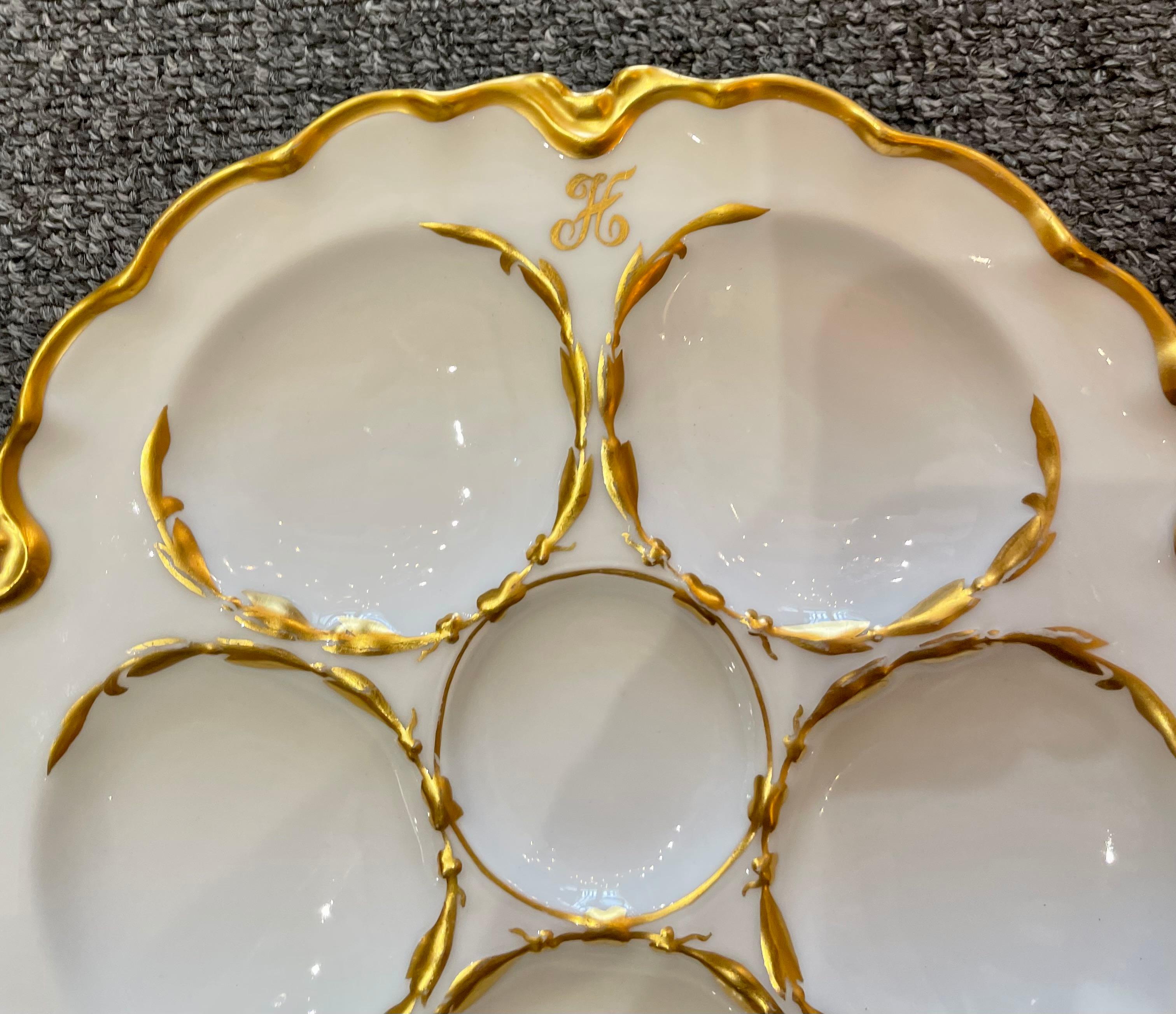 Antique French hand-painted ivory and gold Limoges porcelain oyster plate, signed 