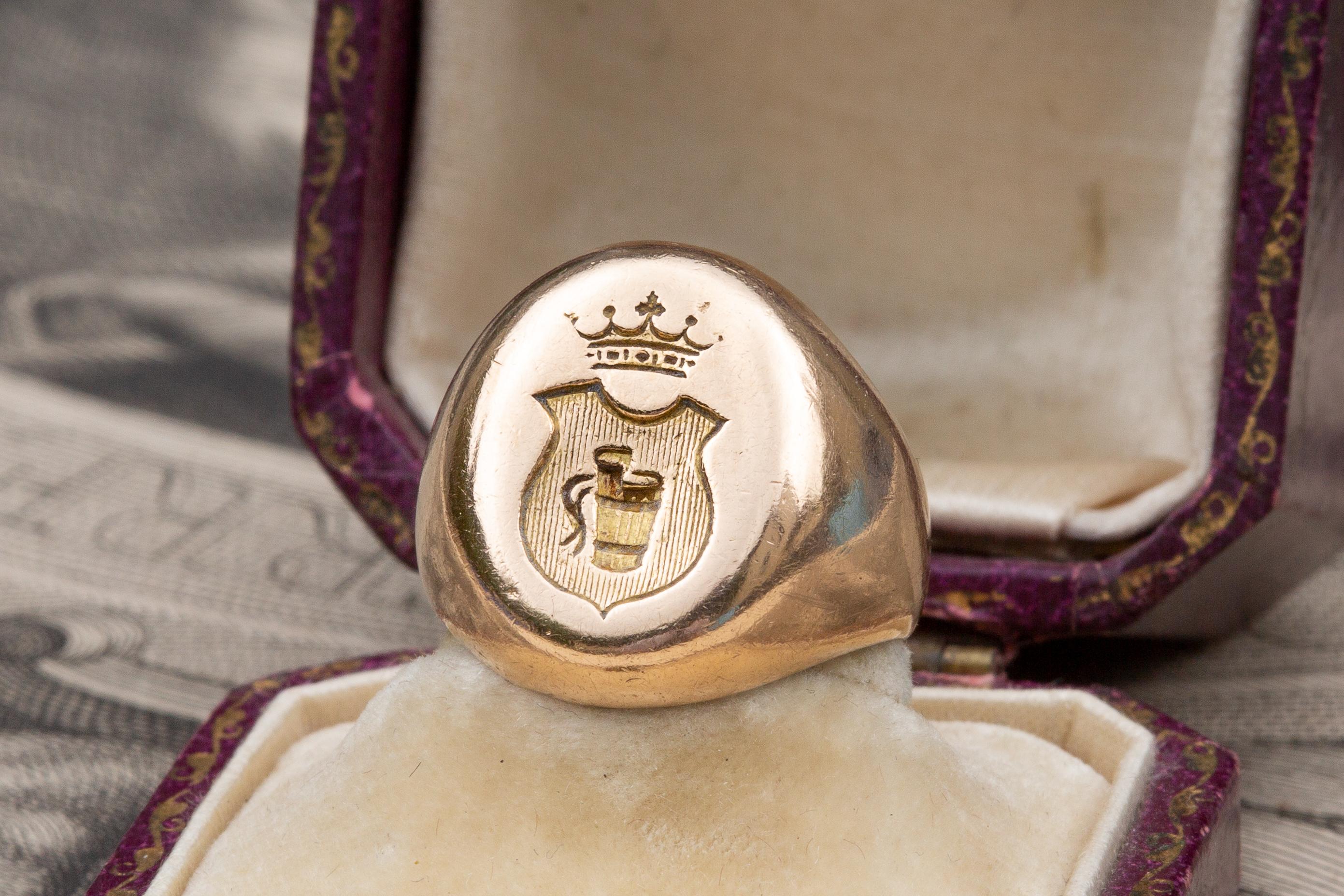 Superb engraved intaglio signet ring made in France dating to the late 19th century. It weighs an impressive 19 grams of 18K gold. The heraldic family coat of arms is intricately carved and in the form of a shield, the specific shape of which is