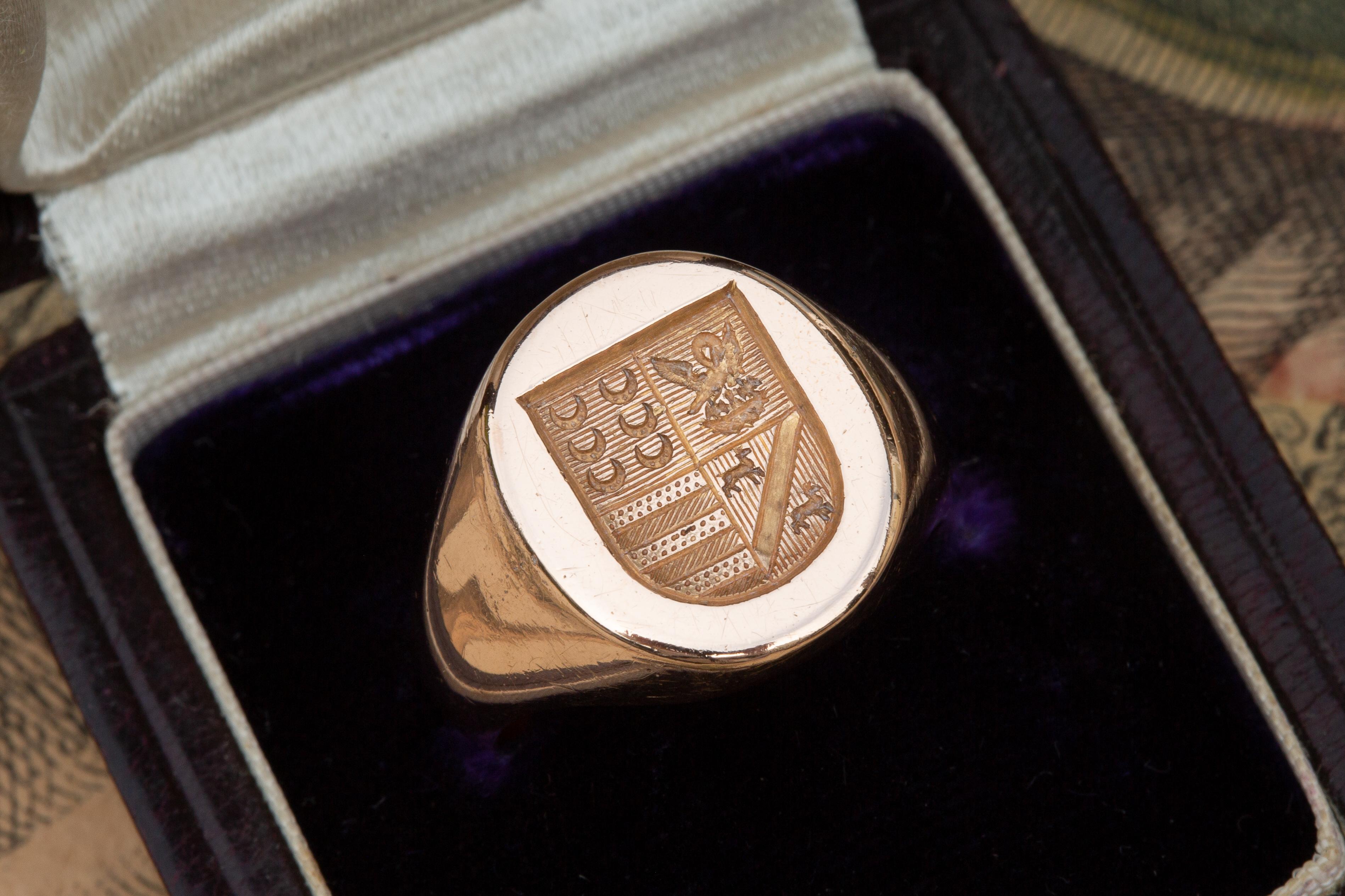Antique French Heavy 18K Gold Coat of Arms Intaglio Signet Ring

Superb engraved intaglio signet ring made in France circa 1900. It weighs an impressive 18 grams of 18K rose gold. The heraldic family coat of arms is intricately carved and in the