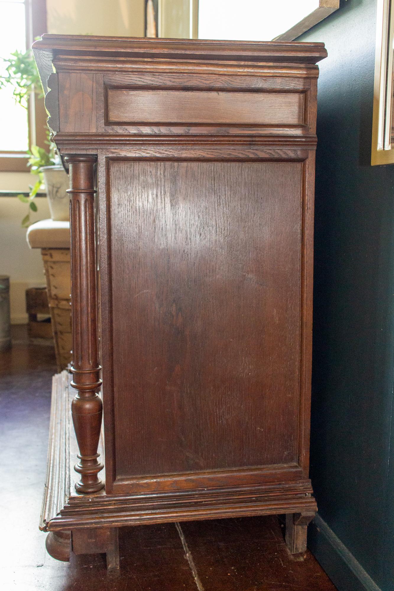 Antique French Henri II Style Oak Carved Buffet with Carved Bow Detail In Good Condition For Sale In Houston, TX