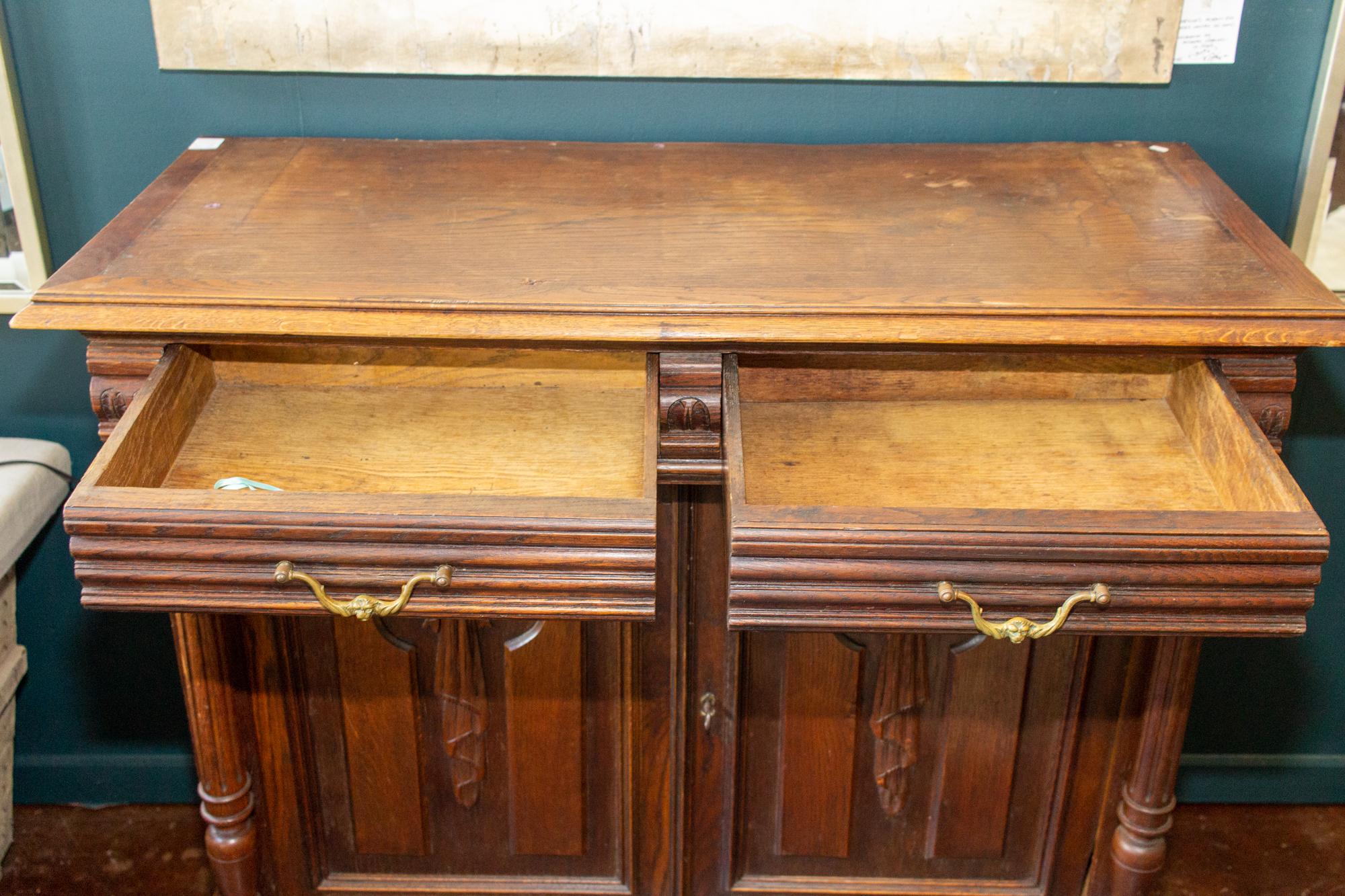 19th Century Antique French Henri II Style Oak Carved Buffet with Carved Bow Detail For Sale