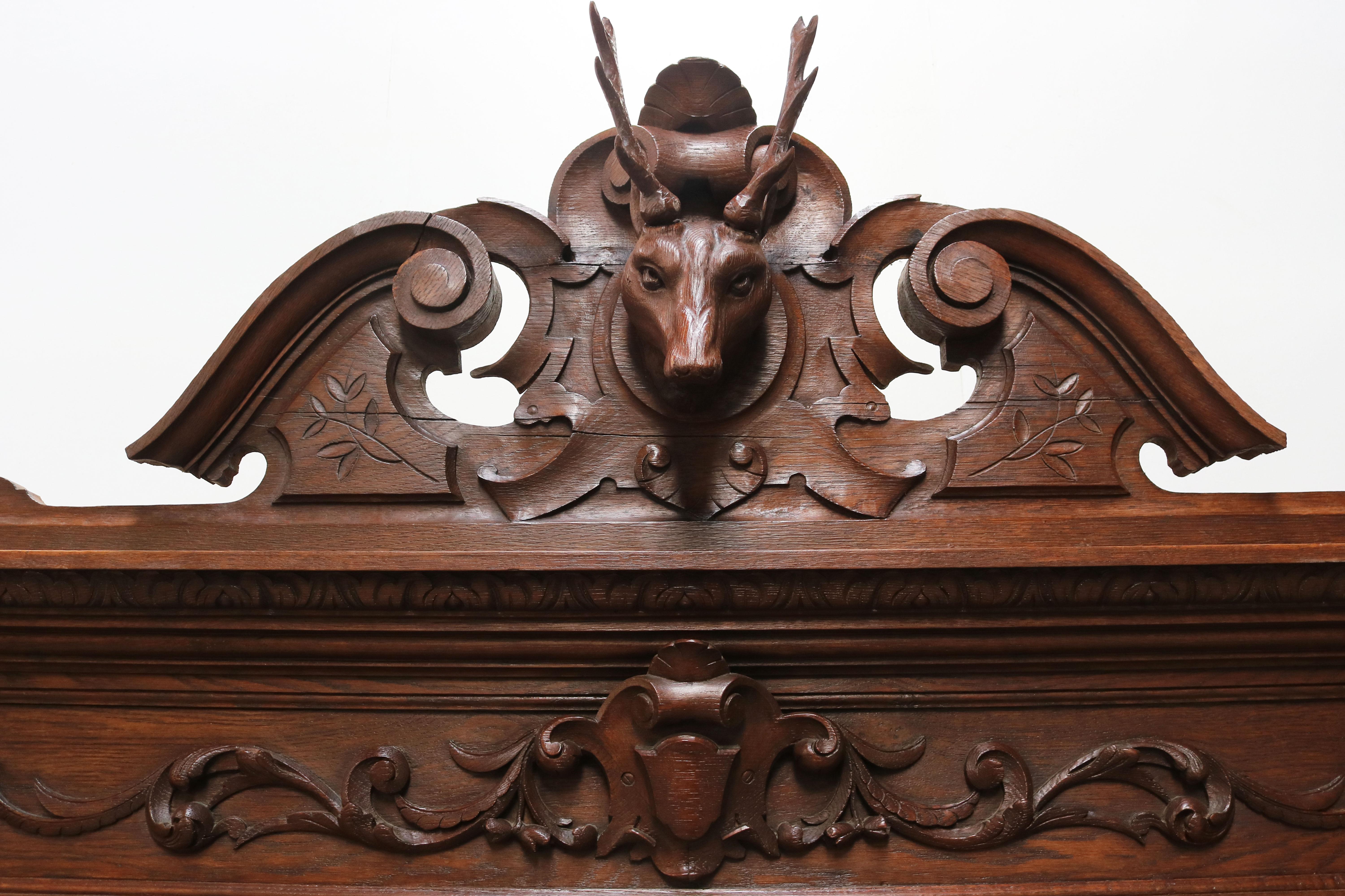 Gorgeous 19th century French hunt style / renaissance revival Cabinet. 
Impressive sculpted Stag on top & four barley twisted columns. 
The cabinet is richly decorated with French hunt / Black Forest style carvings of birds & plants. 
All done in