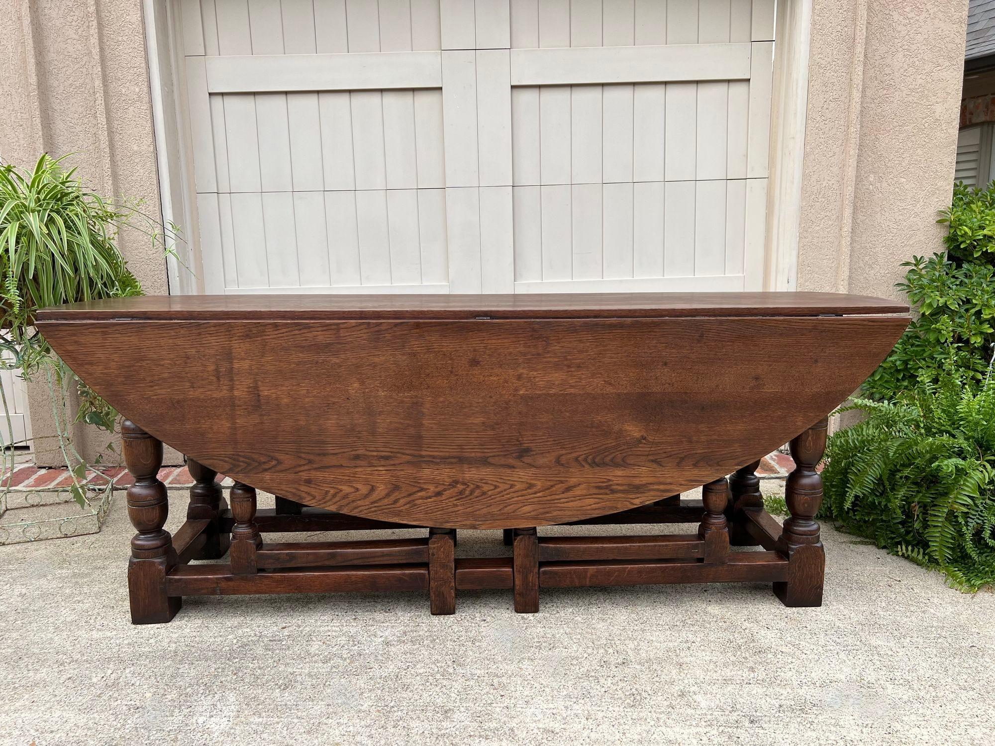 Antique French Hunt Wake Dining Table Oak Drop Leaf Gate Leg LARGE Kitchen.

Direct from France, and one of our customer’s most sought-after table designs, a HUGE, drop leaf, gate leg “wake” or “hunt” table.
The design of these tables makes them so