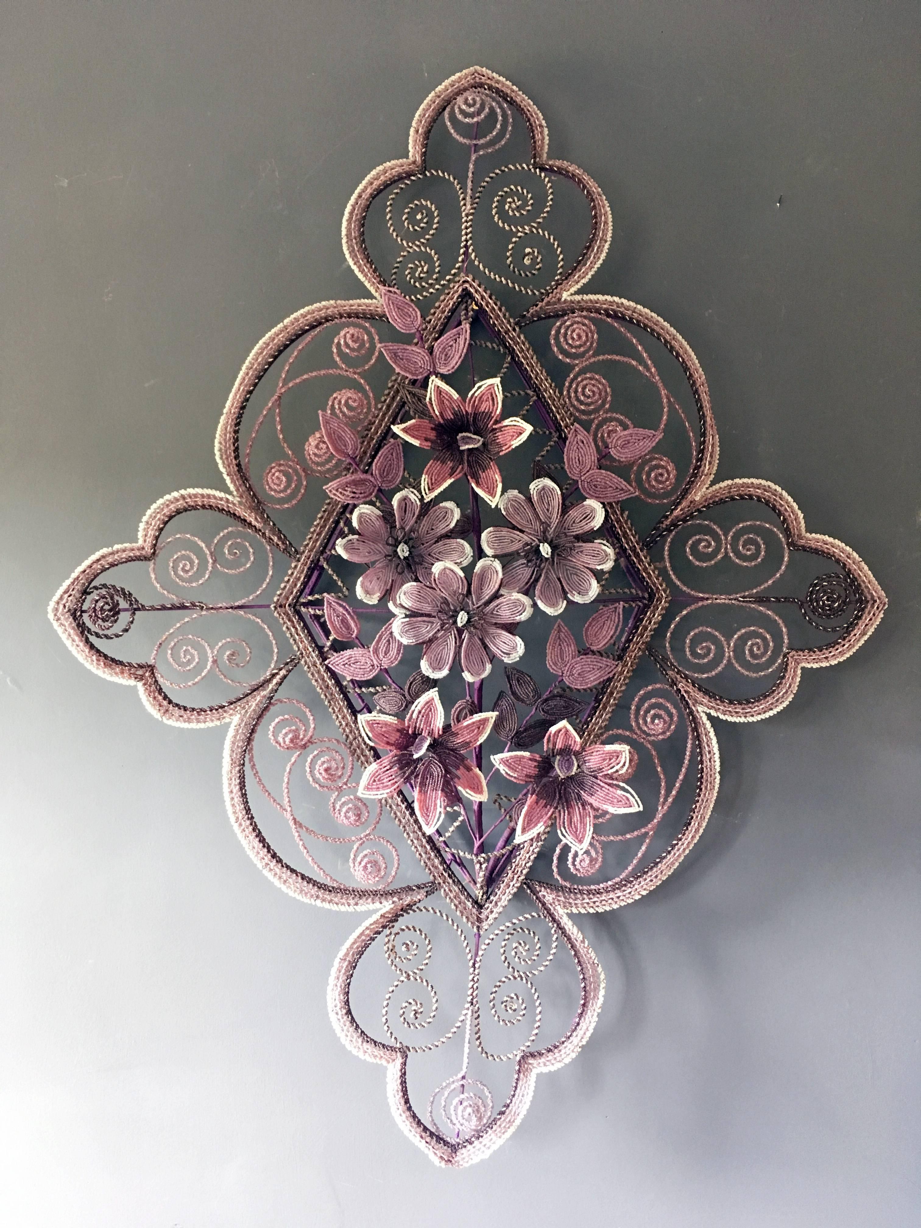 Beautiful antique French beaded wreath
These wreaths were made in France in the early 1900s
These type of beaded flower wreaths were used for funerals and for decoration for ceremonies
The wreath, all flowers and leaves are all in tiny glass