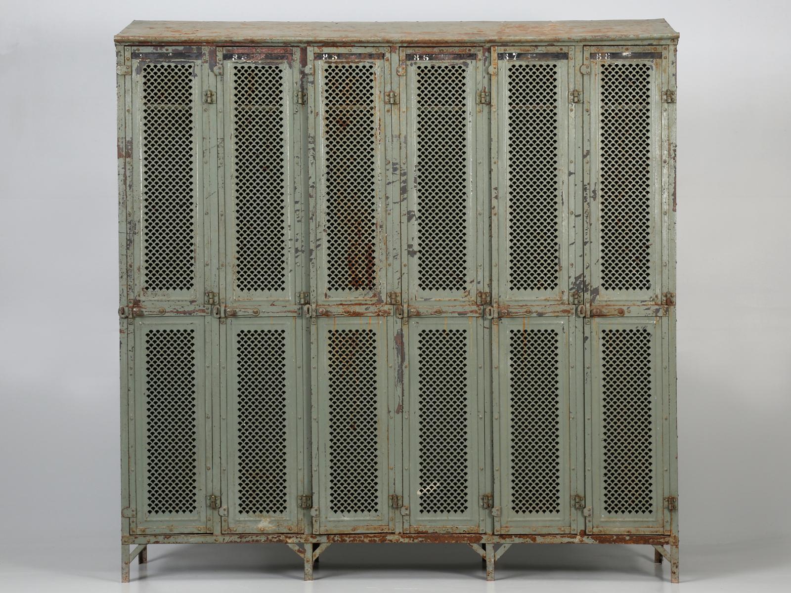 Not very often that we purchase something considered as Industrial, but these old antique French lockers are just so practical for your back hall, that we could not resist. This particular industrial locker set was found in the town of Troyes, in