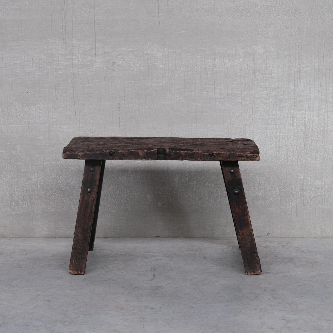 An antique work table. 

France, c1920s. 

Lots of character and wear imprinted over years. It could be used as a desk or display table or as a kitchen prep-table. 

Hand made, the legs simply rest in the top so it can be deconstructed for