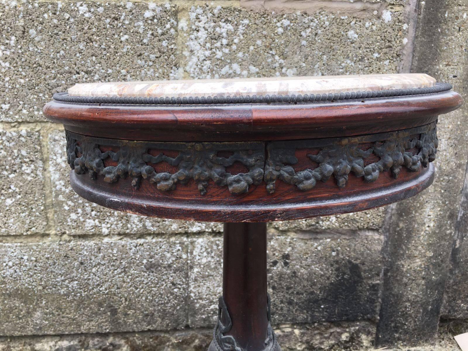 This listing is for a lovely french antique inlaid side table. Nice bronze detailing with Marble top. Very old, see all pictures listed.


Dimensions- 43cm wide and 68cm tall

 
See my other ads for more french furniture.