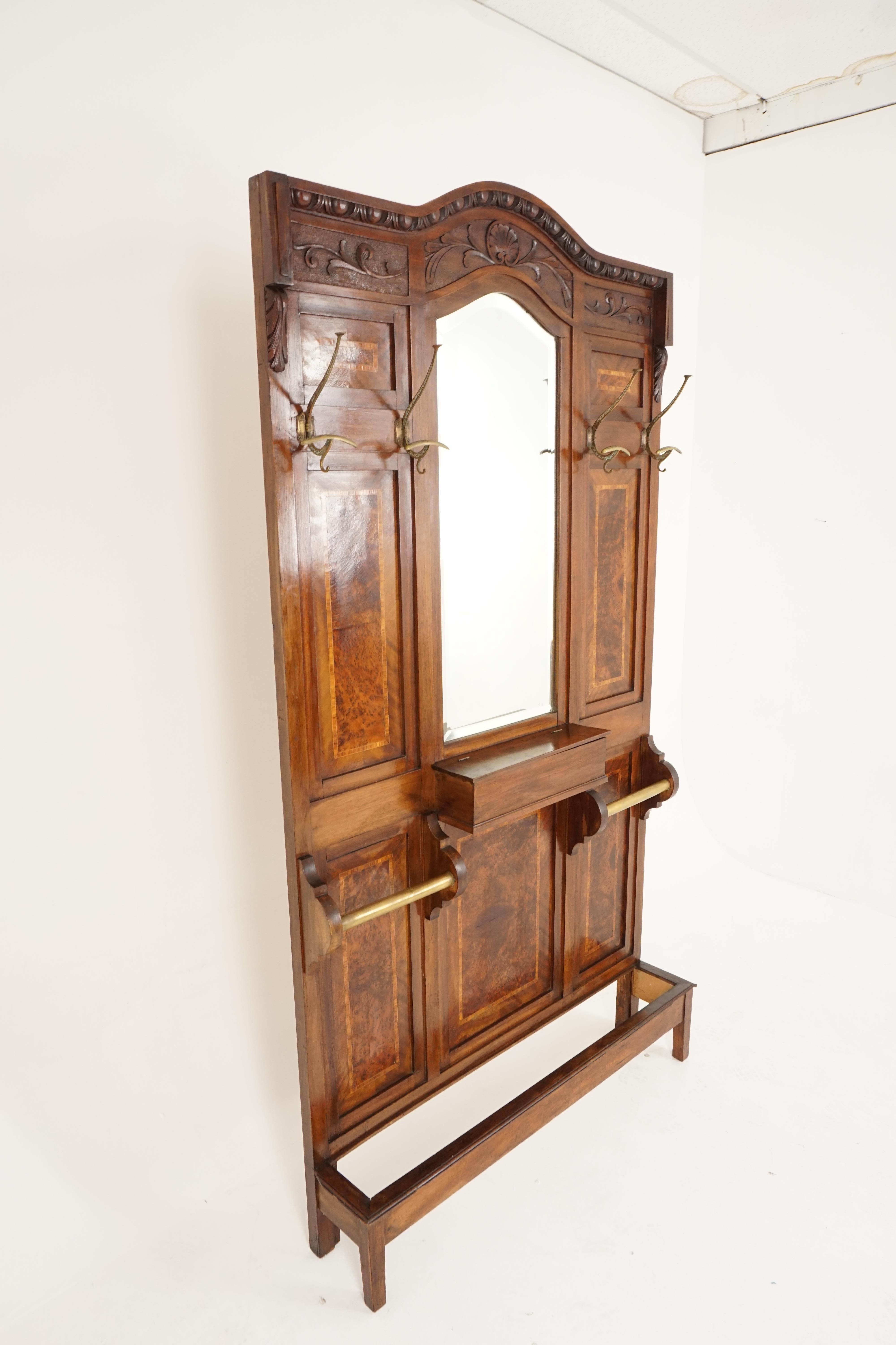 Antique french inlaid hall Stand, Walnut hall tree, coat and hat rack, France 1900, B2520

France 1900
Solid Walnut + veneers
Original finish
Carved shaped top
Three carved panels below
Original shaped beveled mirror
Inlaid panels on sides and in