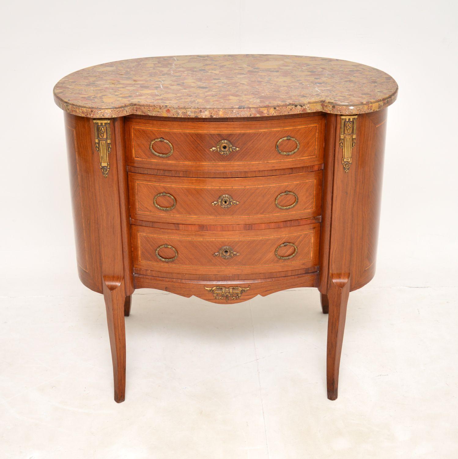 A stunning antique French marble top commode chest, dating from around the 1900-1920’s period.

It has a beautiful shape and is a useful and impressive size. The back is curved and nicely finished, so this can be used as a free standing item; the