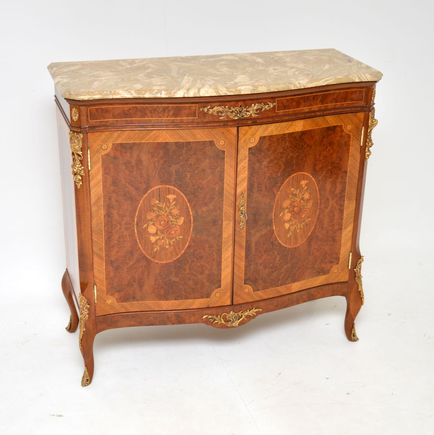 A beautiful and very well made antique French marble top cabinet. This was made in France, it dates from around the 1930-50’s.

The quality is superb, this is very well made from various woods, predominantly walnut. There are high quality ormolu