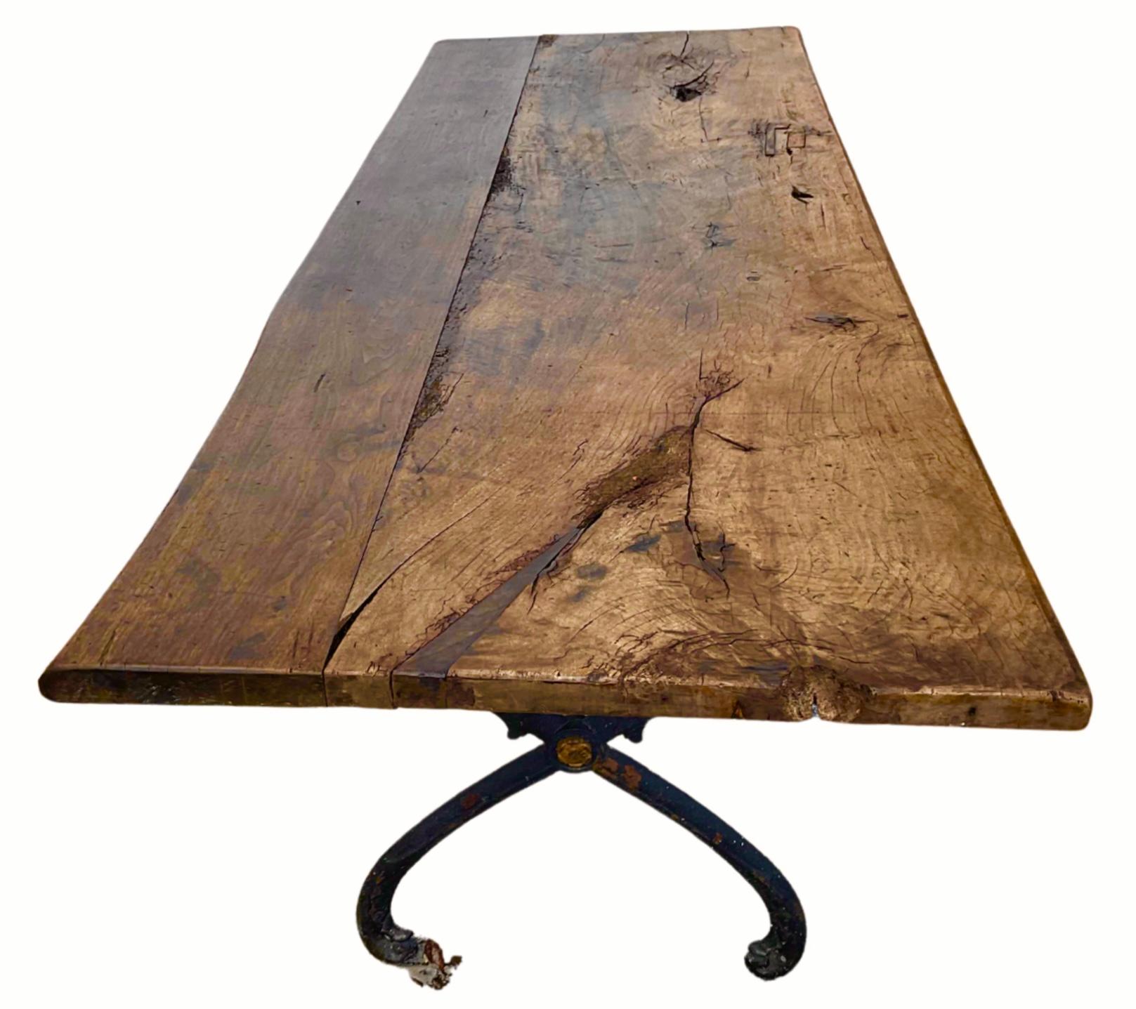 Antique French Iron Bistro Table with Rustic Walnut Top In Fair Condition In Bradenton, FL