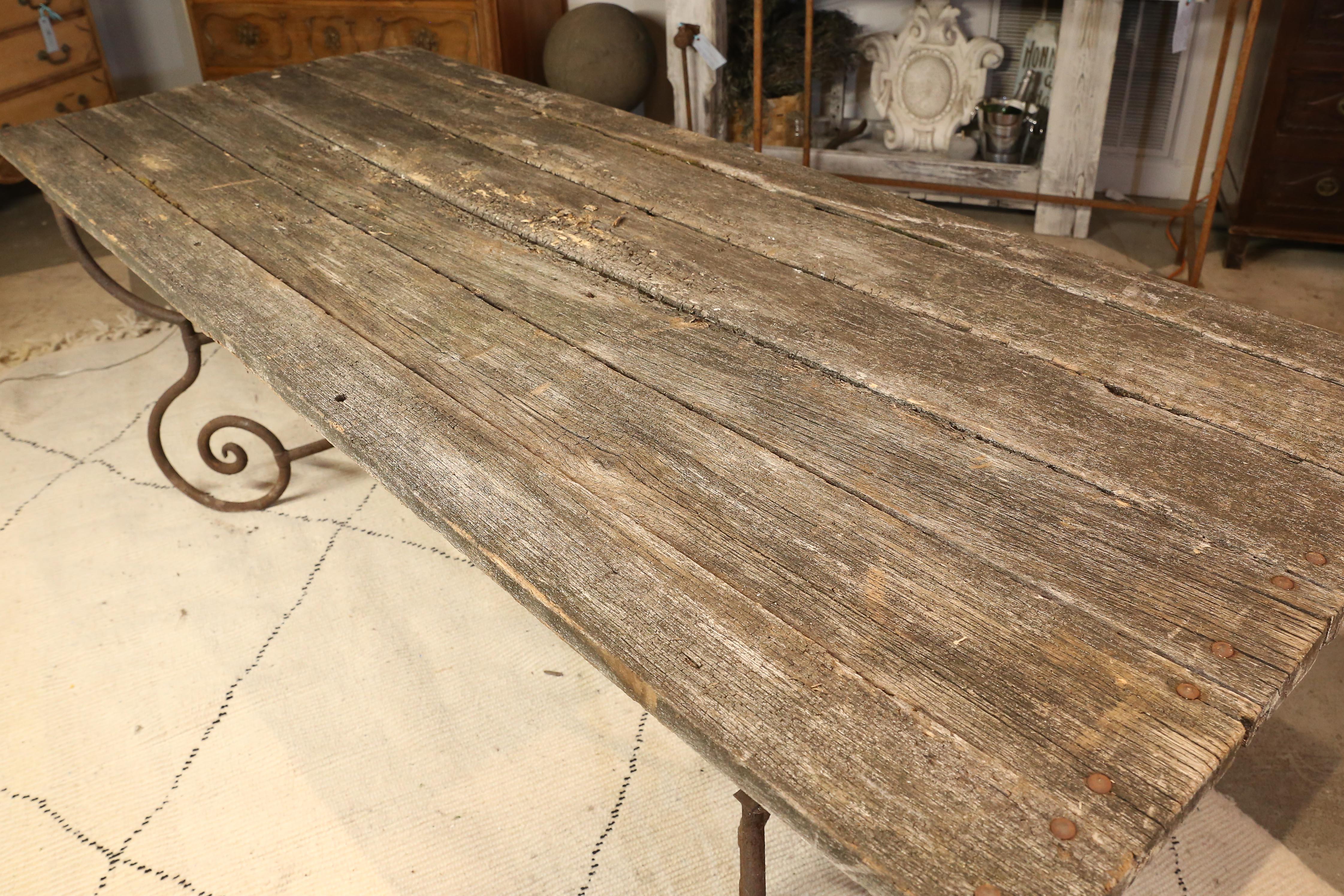Antique French Iron Garden Table with Distressed Wood Top 5