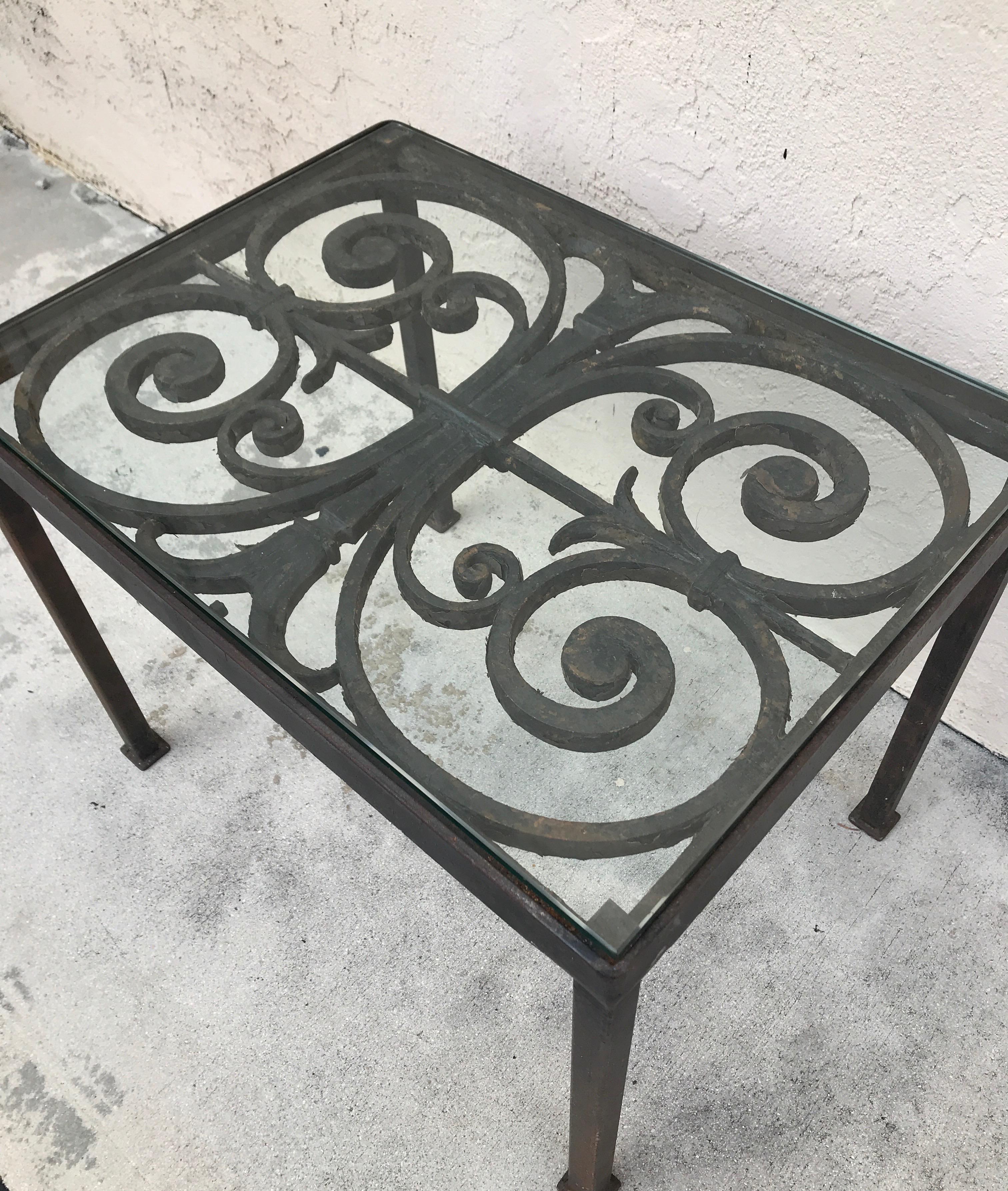 French hand forged wrought iron gate side/end table with glass top.