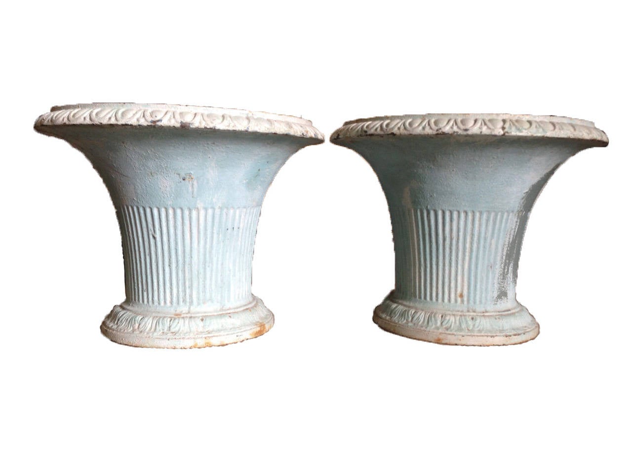 Pair of 19th century French iron jardinières with stunning blue patina. One jardinière has a stain on one side consistent with exterior use.