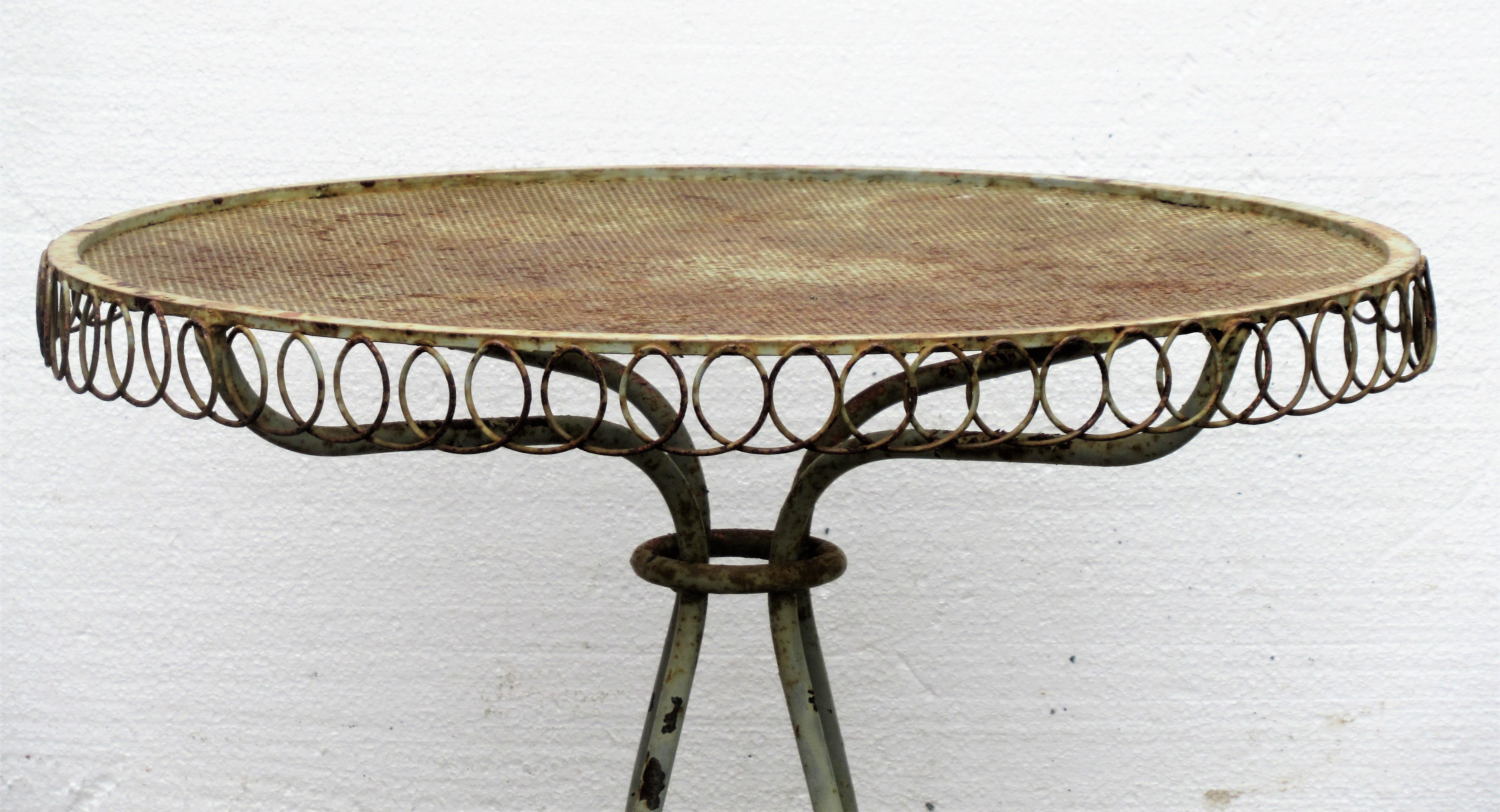 Antique French wire and iron garden small bistro type table with fine mesh top in overall beautifully aged old worn pale celery green painted surface. Exceptional quality, circa 1900 - 1930. This one's a gem.
 Look at all pictures and read condition