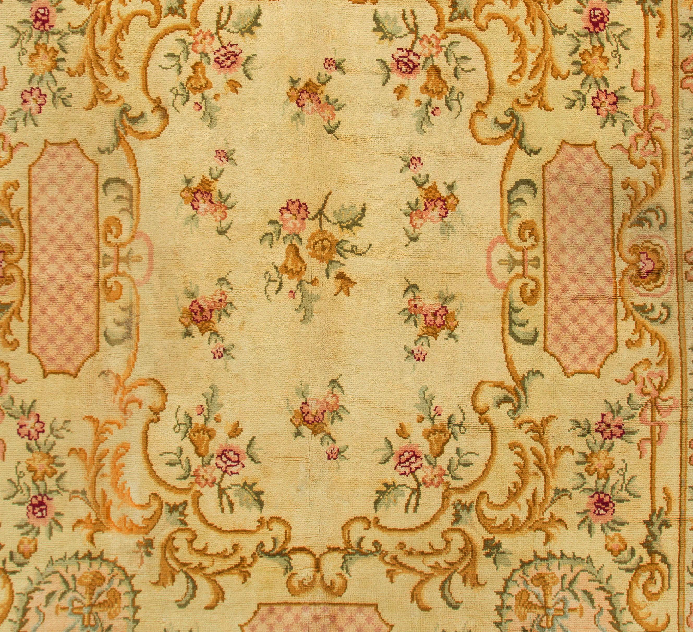 Antique French ivory Savonnerie carpet. French Savonnerie carpet with traditional European floral motif, ivory/soft pink/multi. Size: 10'4 x 12'8.