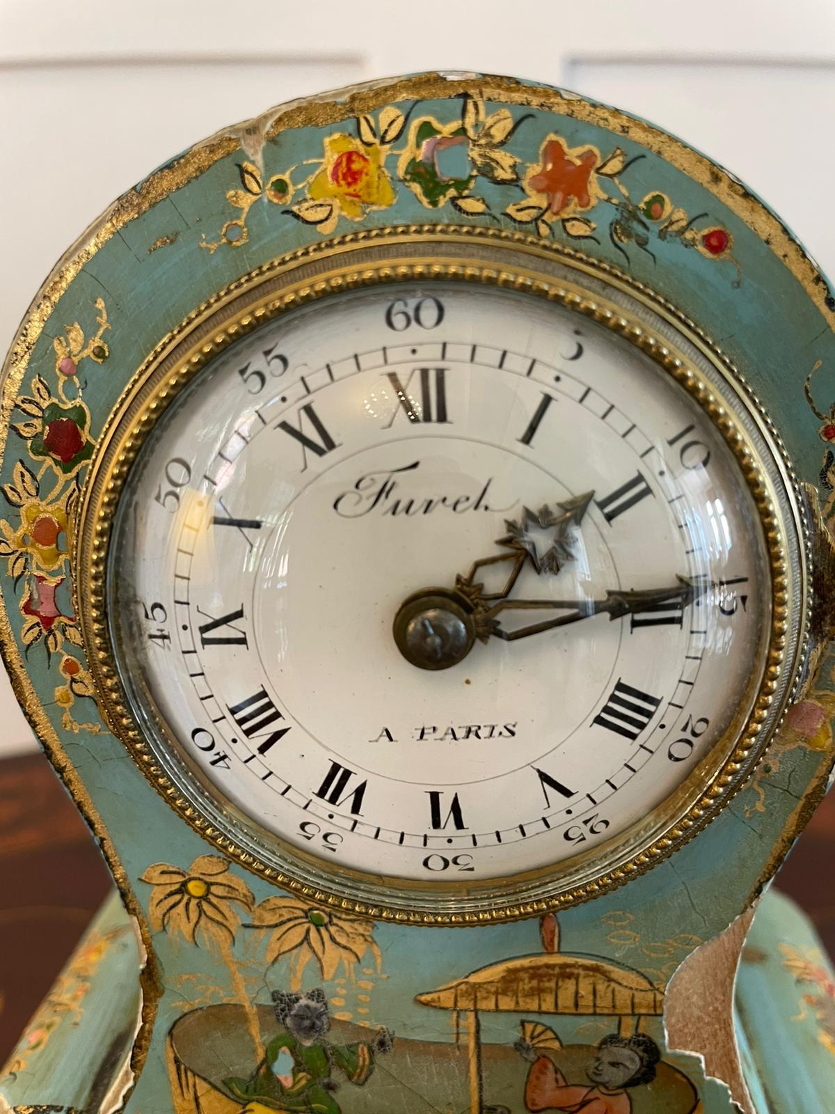 Antique French Japanned balloon desk clock boasting a pretty enamel dial with Roman and Arabic numerals, signed Furet A Paris. The case is beautifully decorated and is raised by Japanese figures with gilt highlights on a green background. It stands
