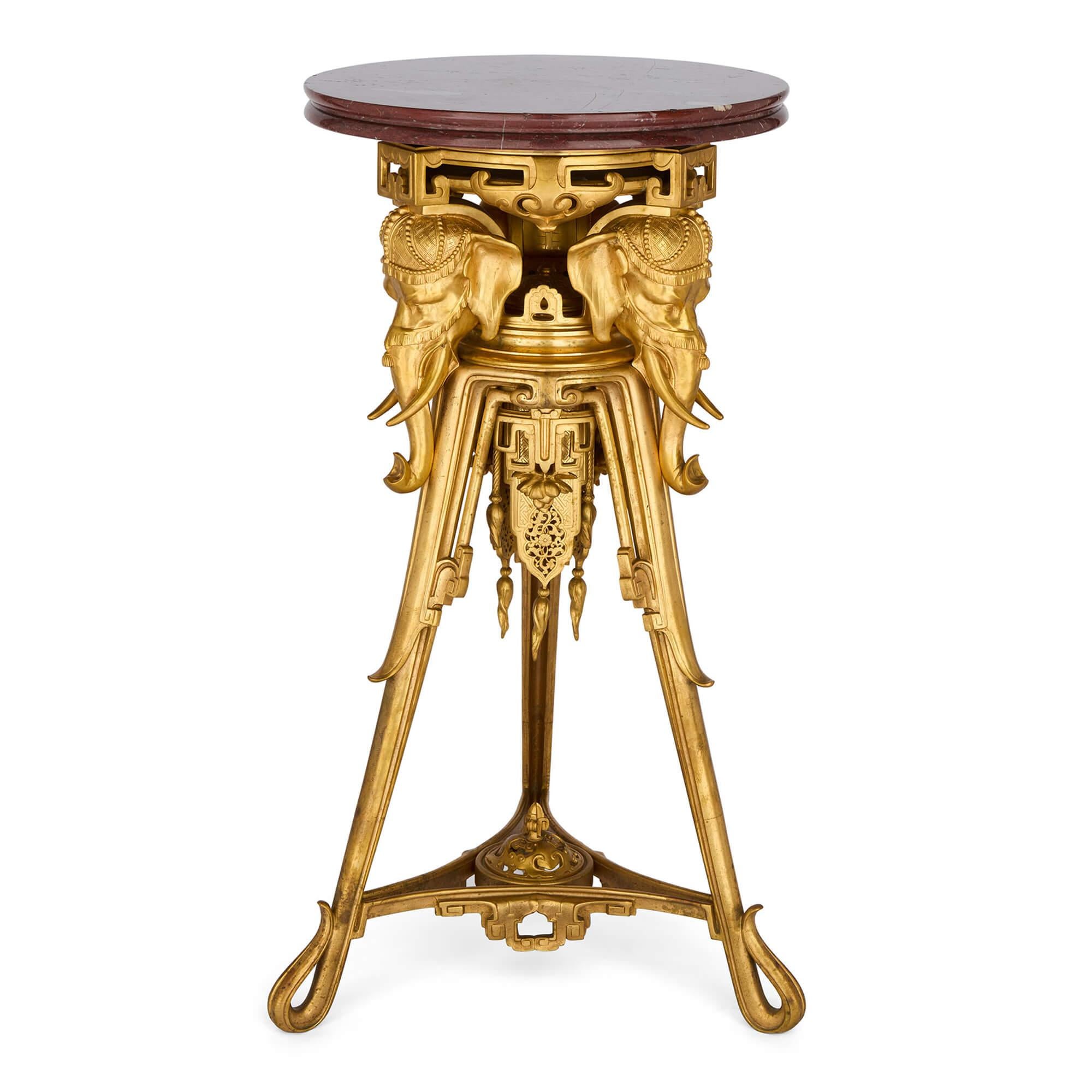 Antique French Japonisme Gold Ormolu Gilt Bronze Marble Pedestal Maison Marnyhac
French, Late 19th Century
Height 104cm, width 62cm, depth 52cm

This exceptional pedestal, created in the spirit of Japonisme, dates to the late 1800s and showcases the