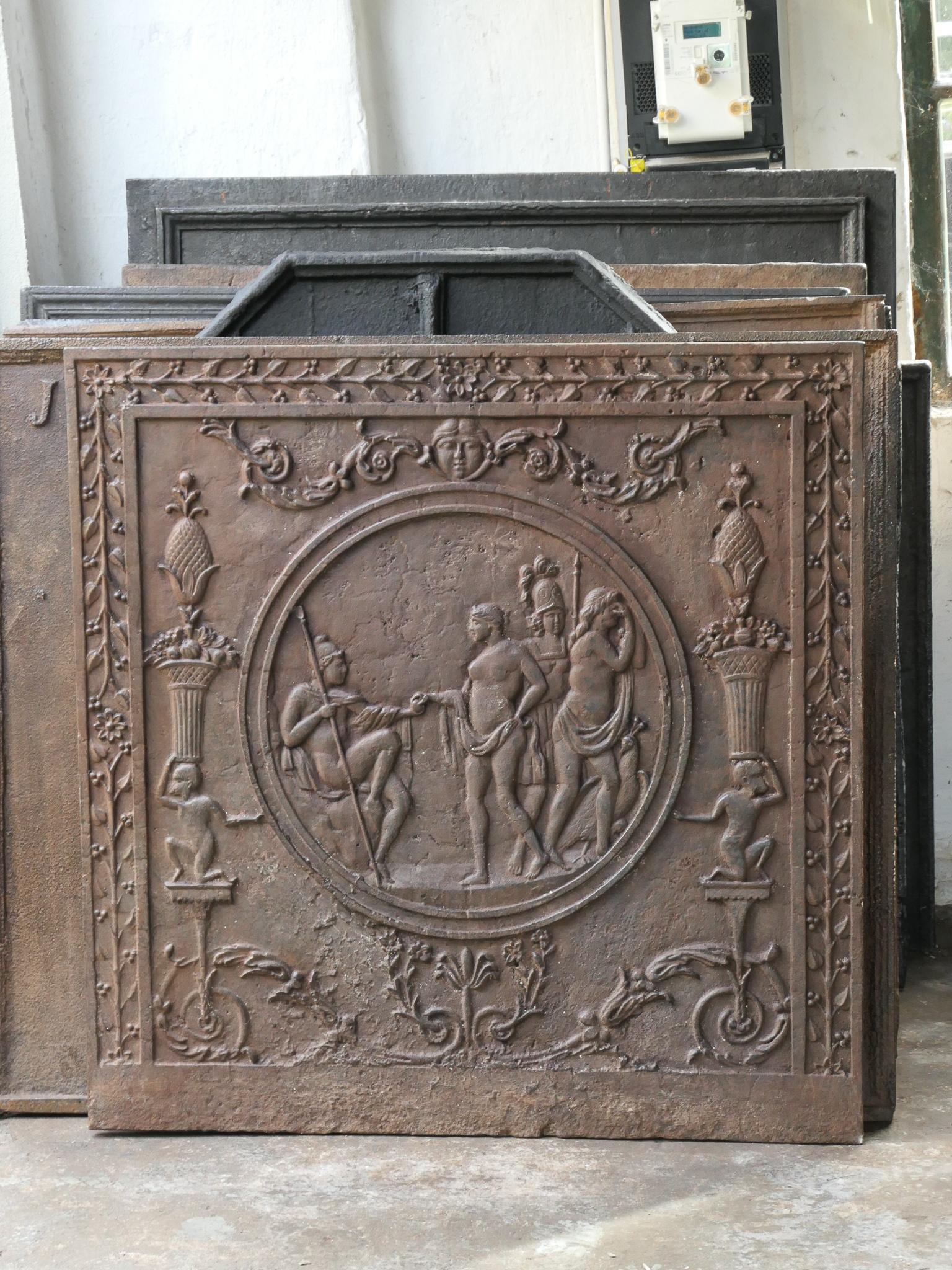 Late 18th or early 19th century French fireback with the Judgement of Paris. Neoclassical period. The fireback is made of cast iron and has a natural brown patina. Upon request it can be made black / pewter. The condition is good, no cracks.

This