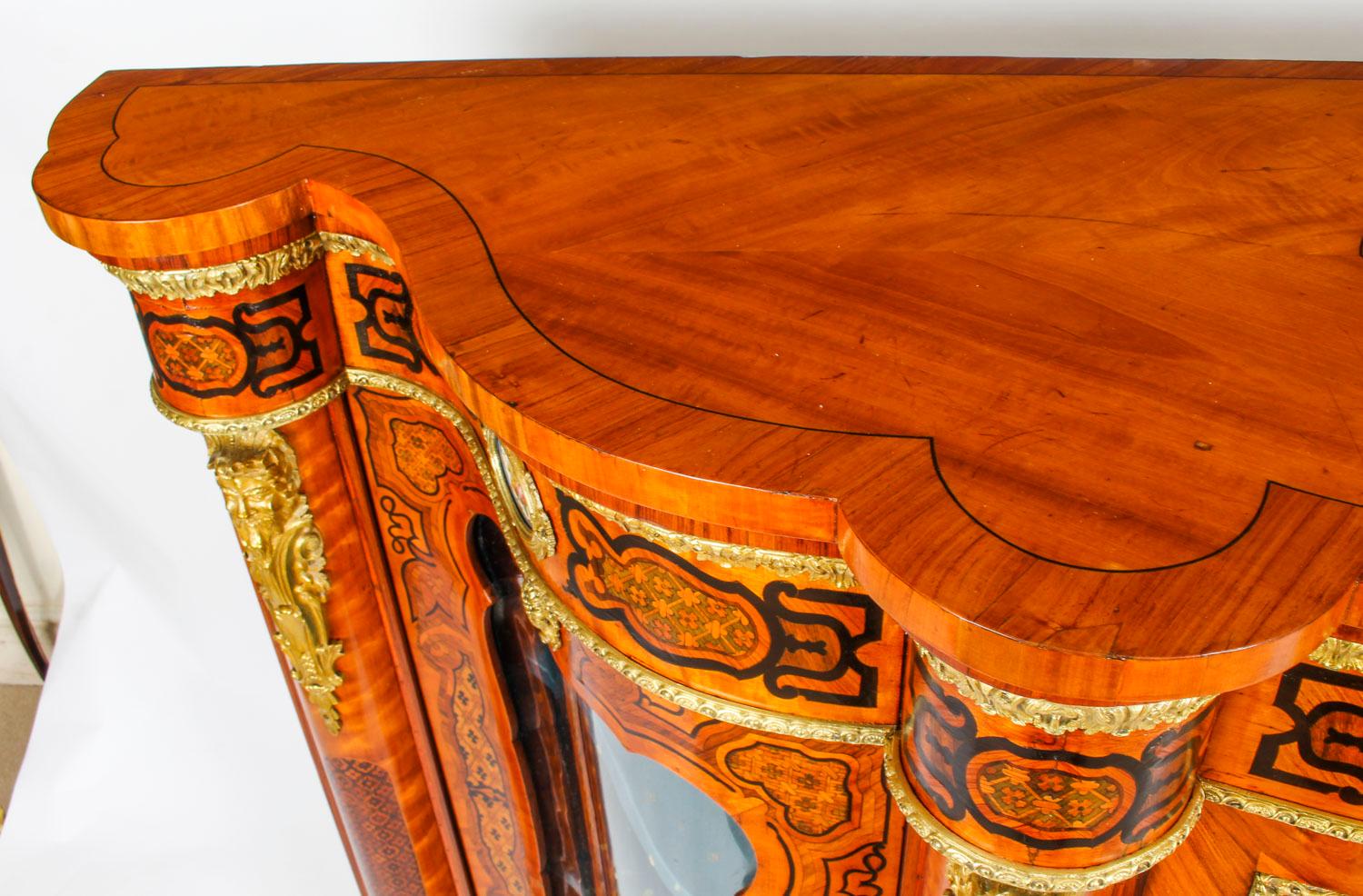 This is a superb antique French kingwood and marquetry inlaid serpentine credenza, circa 1870 in date.

Oozing sophistication and charm, this credenza is the absolute epitome of French High Society.

The entire piece highlights the unique and truly