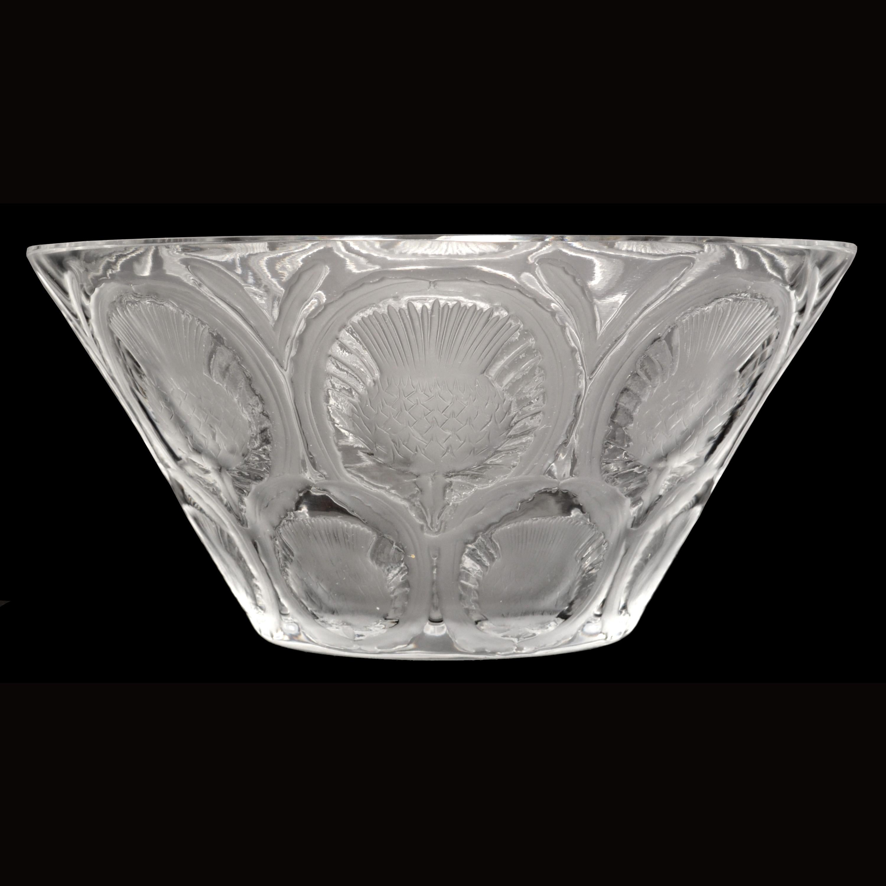 A good 1930's Art Deco Lalique crystal glass center bowl, in the Chardons (thistle) pattern, having alternating and repeated patterns of both frosted and clear glass with embossed images of thistles. The bowl having the 