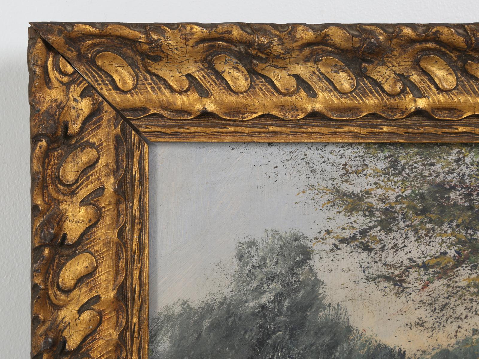 Ancienne peinture à l'huile de paysage français, sur lin, signée Baldy, dans ce qui semble être son cadre doré d'origine. Probablement peint au début des années 1900, représentant une personne sur une route de campagne isolée. Joli cadre en bois