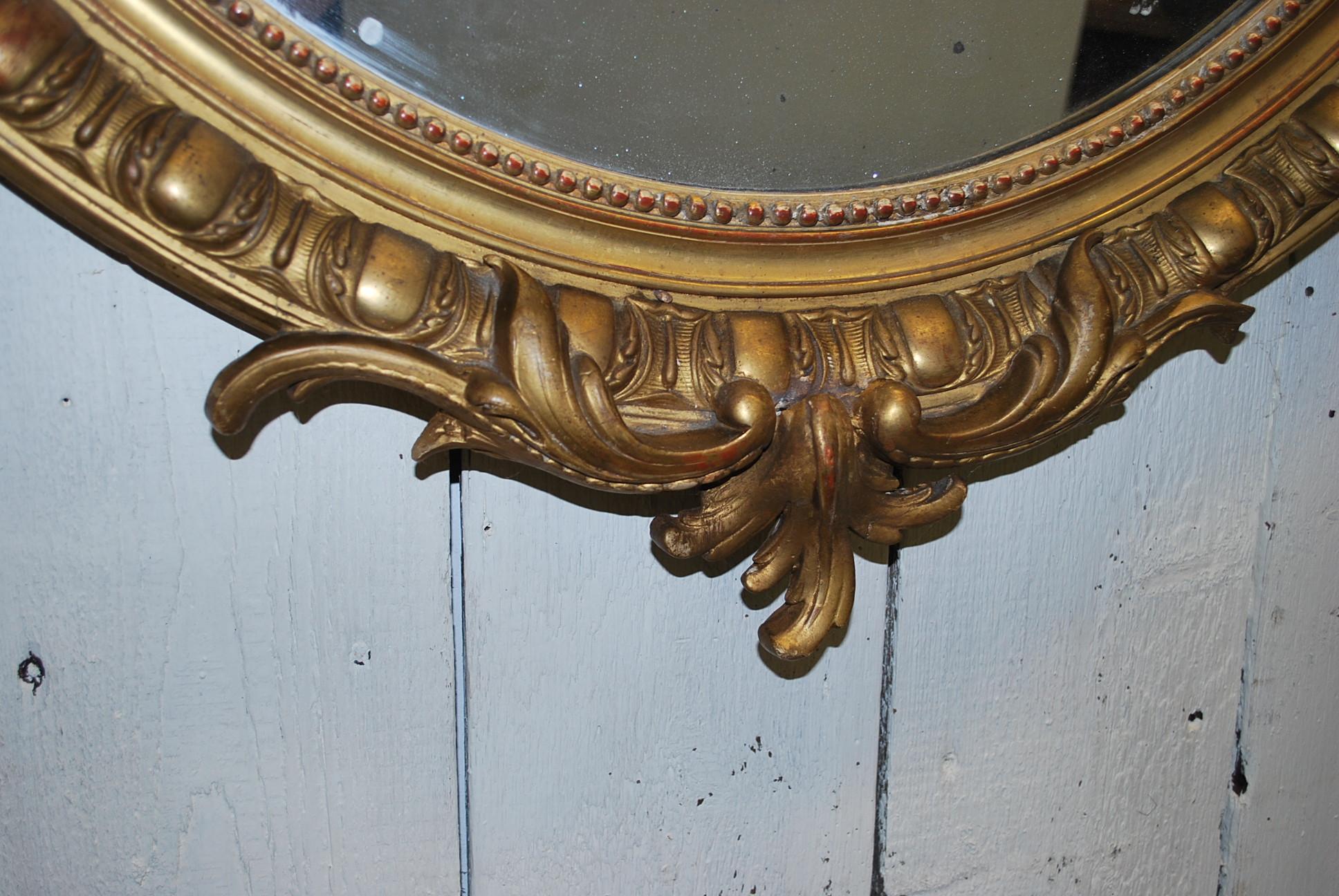 Rococo Antique French large Gilded overmantle Oval wall Mirror, circa 1850 For Sale