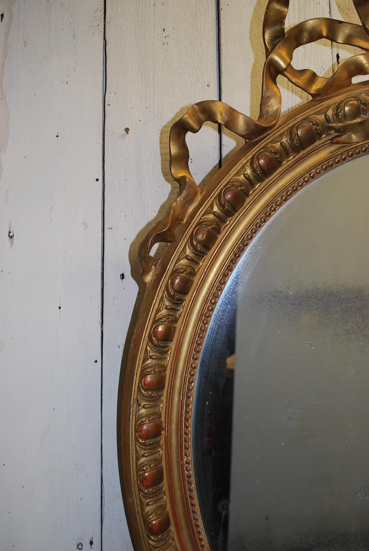 Gilt Antique French large Gilded overmantle Oval wall Mirror, circa 1850 For Sale
