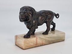 Antique French late 19th century bronze study of a prowling lion circa 1900
