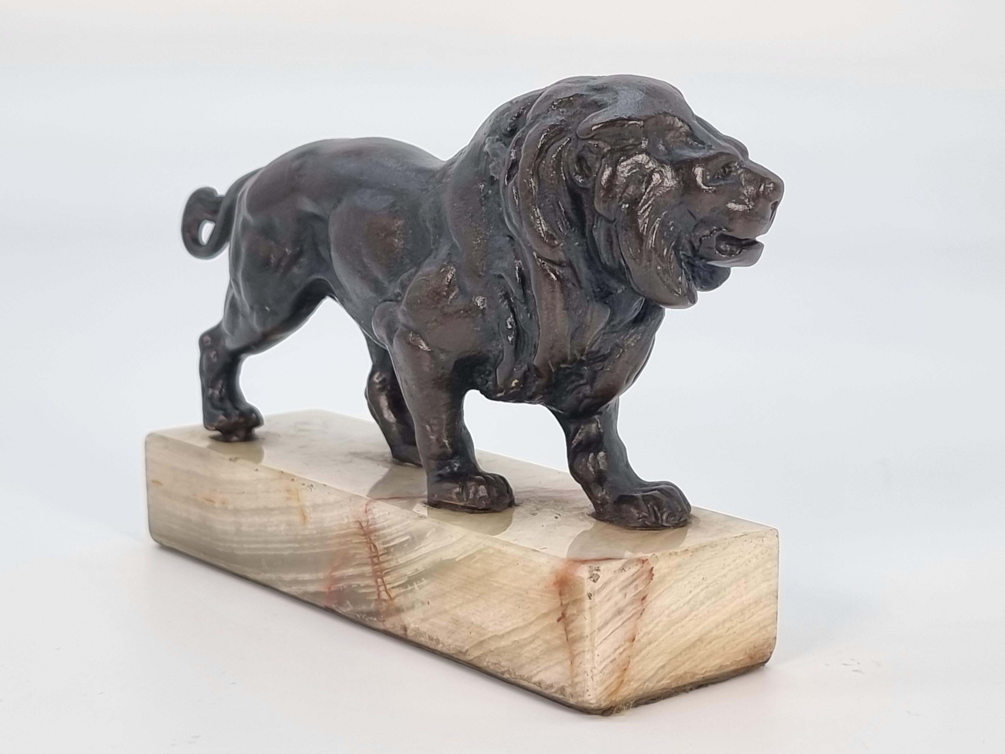 Cast Antique French late 19th century bronze study of a prowling lion circa 1900 For Sale