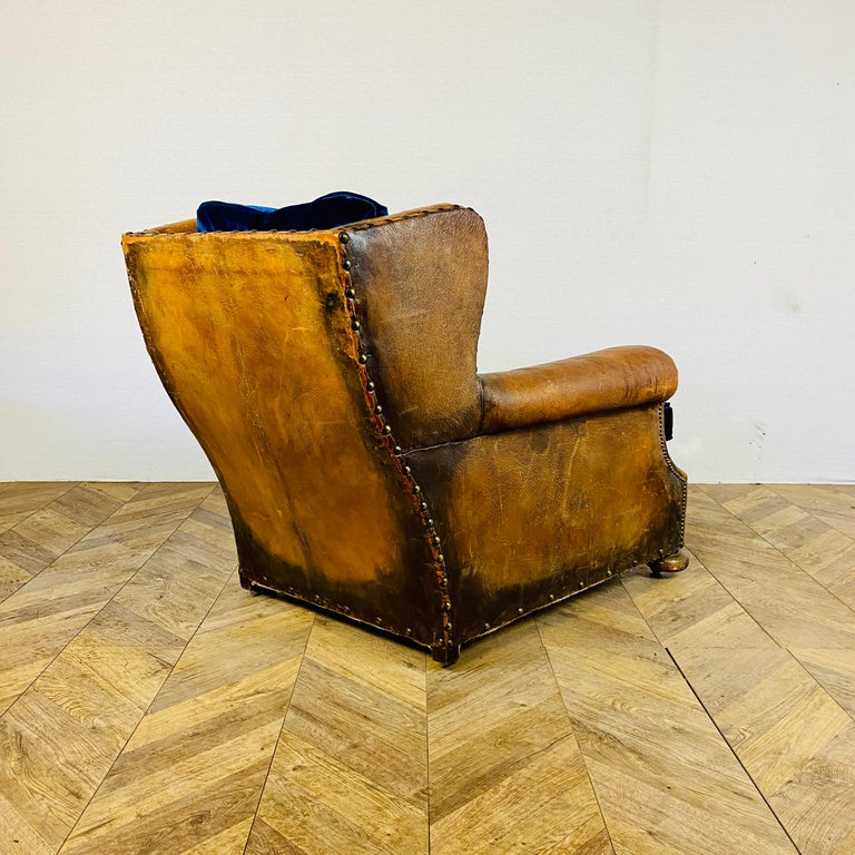Antique French Leather Club Armchair on Castors, circa 1900s For Sale