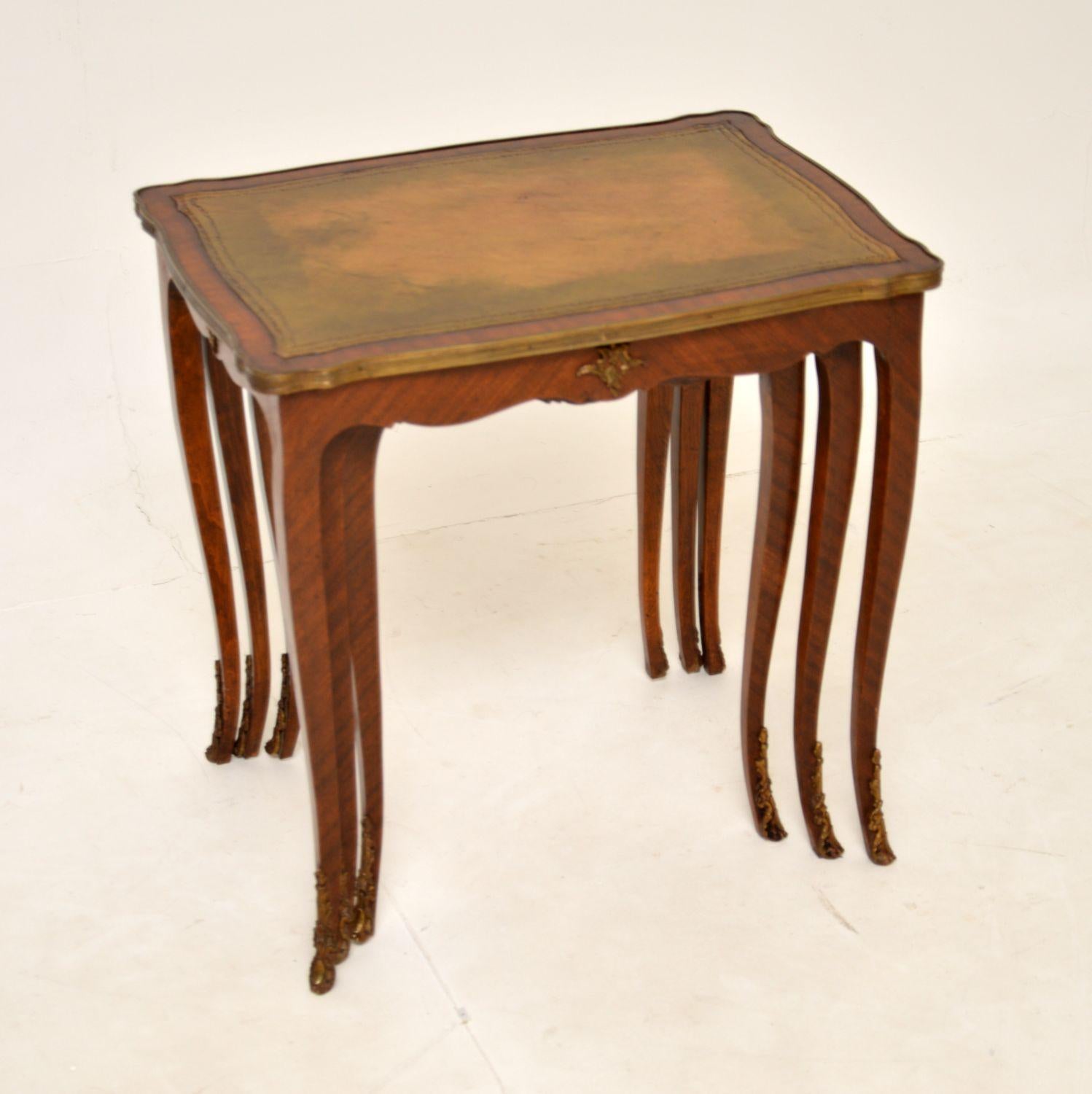A gorgeous antique French nest of tables, with inset leather tops. They were made in France, and date from around the 1920-1930’s.

The quality is superb, they are a lovely size and have a very useful design. The inset leather tops are hand coloured