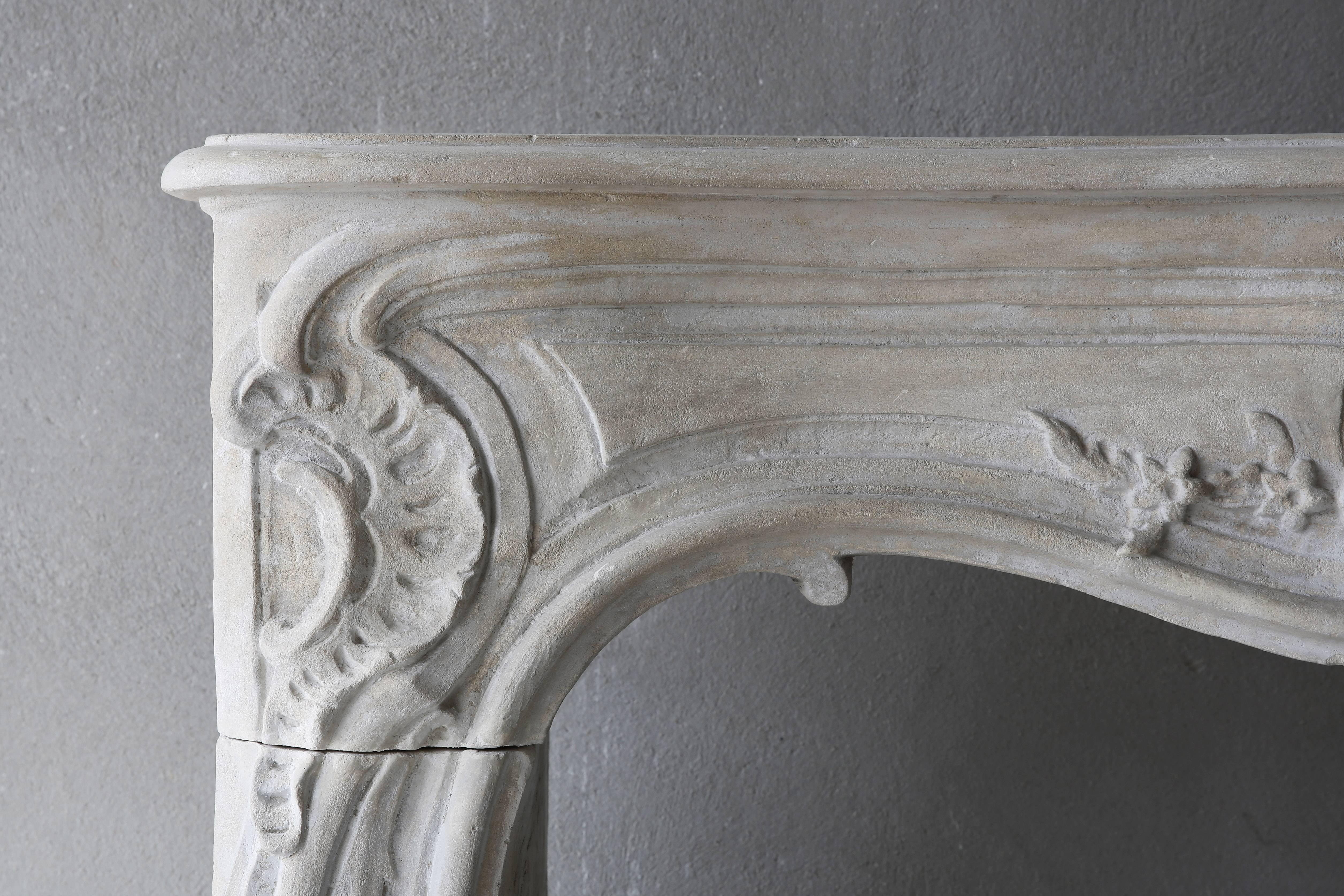 18th Century and Earlier Antique French Limestone Fireplace of the 18th Century, Style of Louis XV