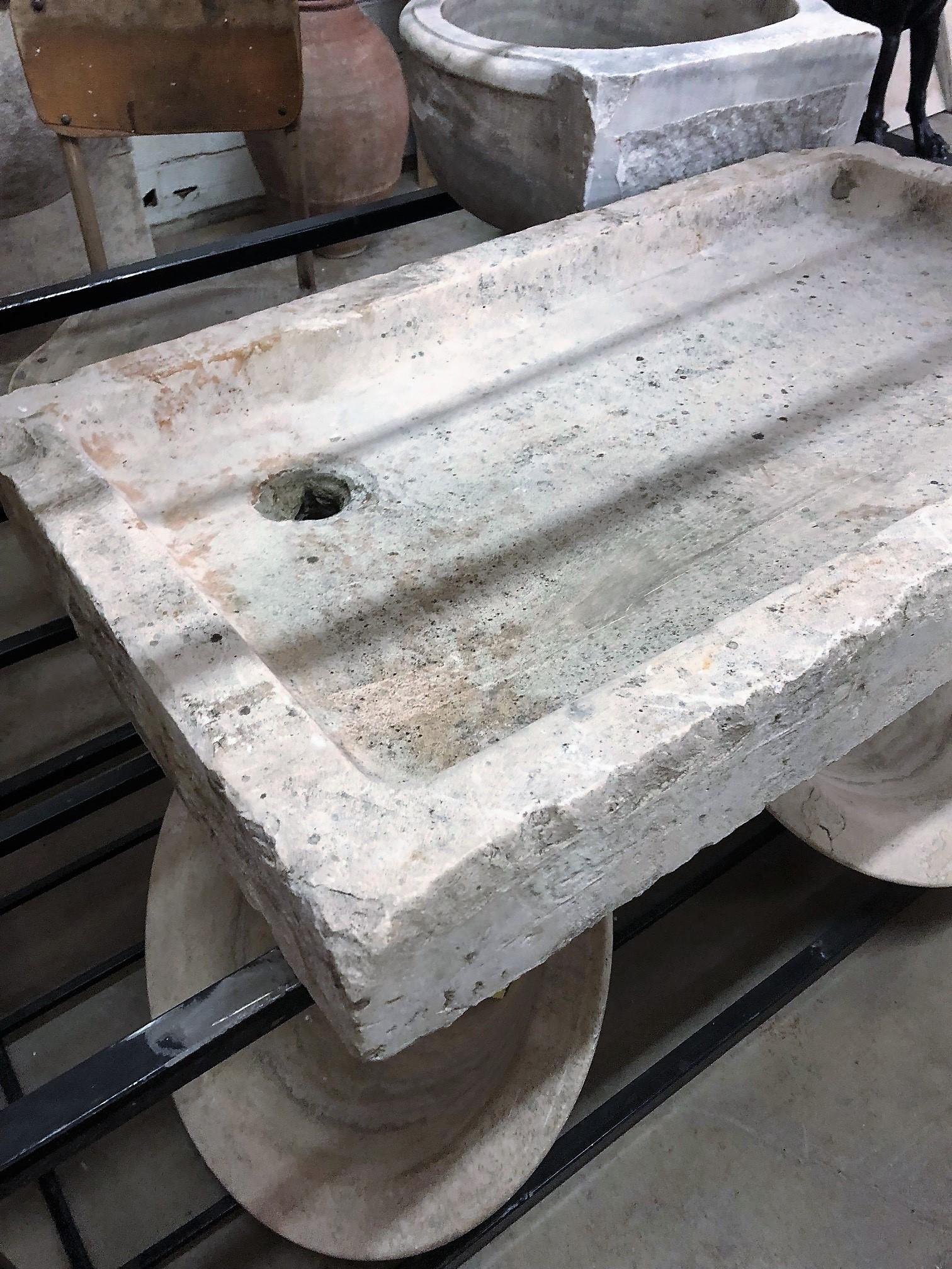 This antique limestone sink is perfect for your renovation project.

Origin France,

circa 1800.

Measurements: 35 3/4
